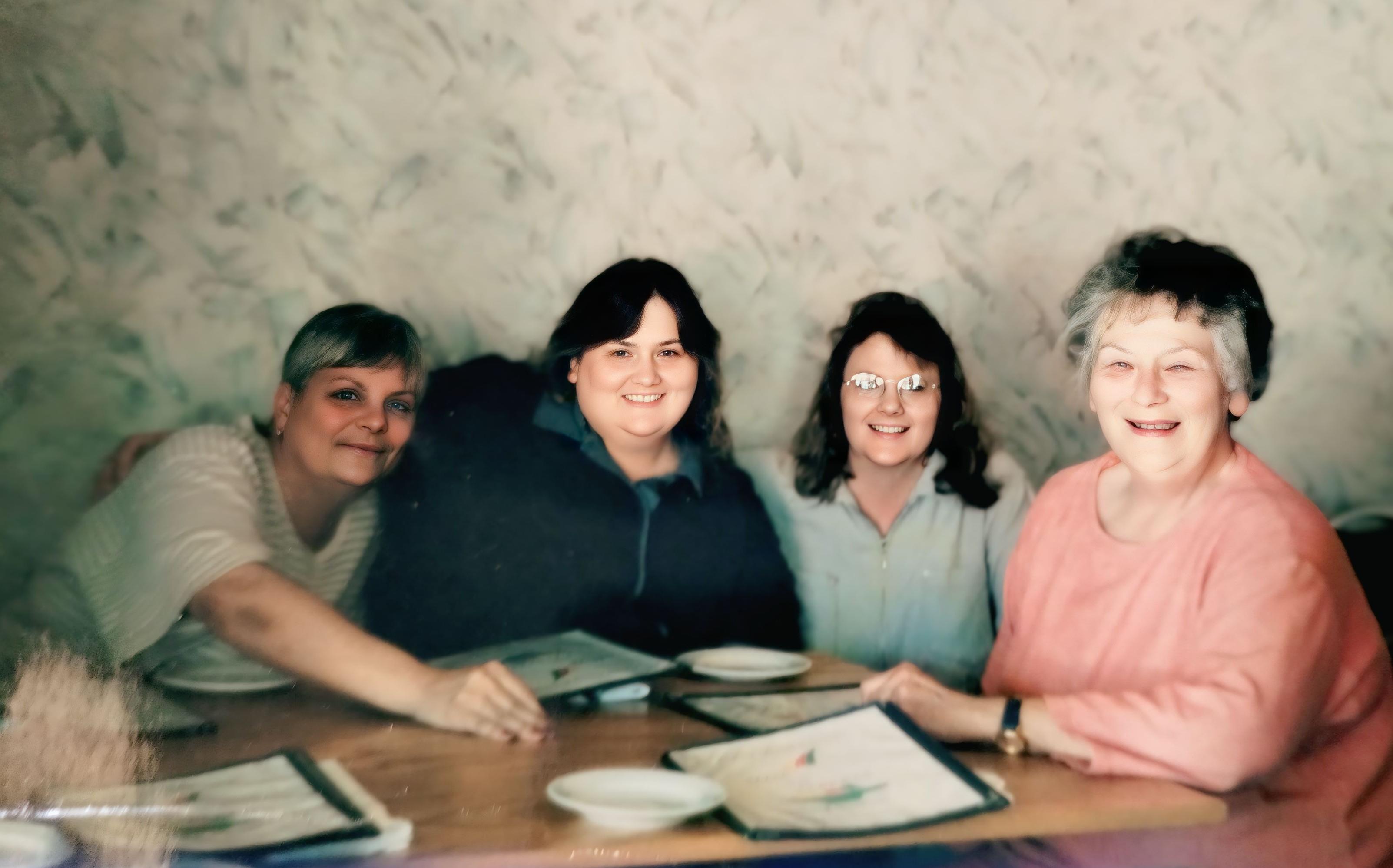 A group of women sitting at a table