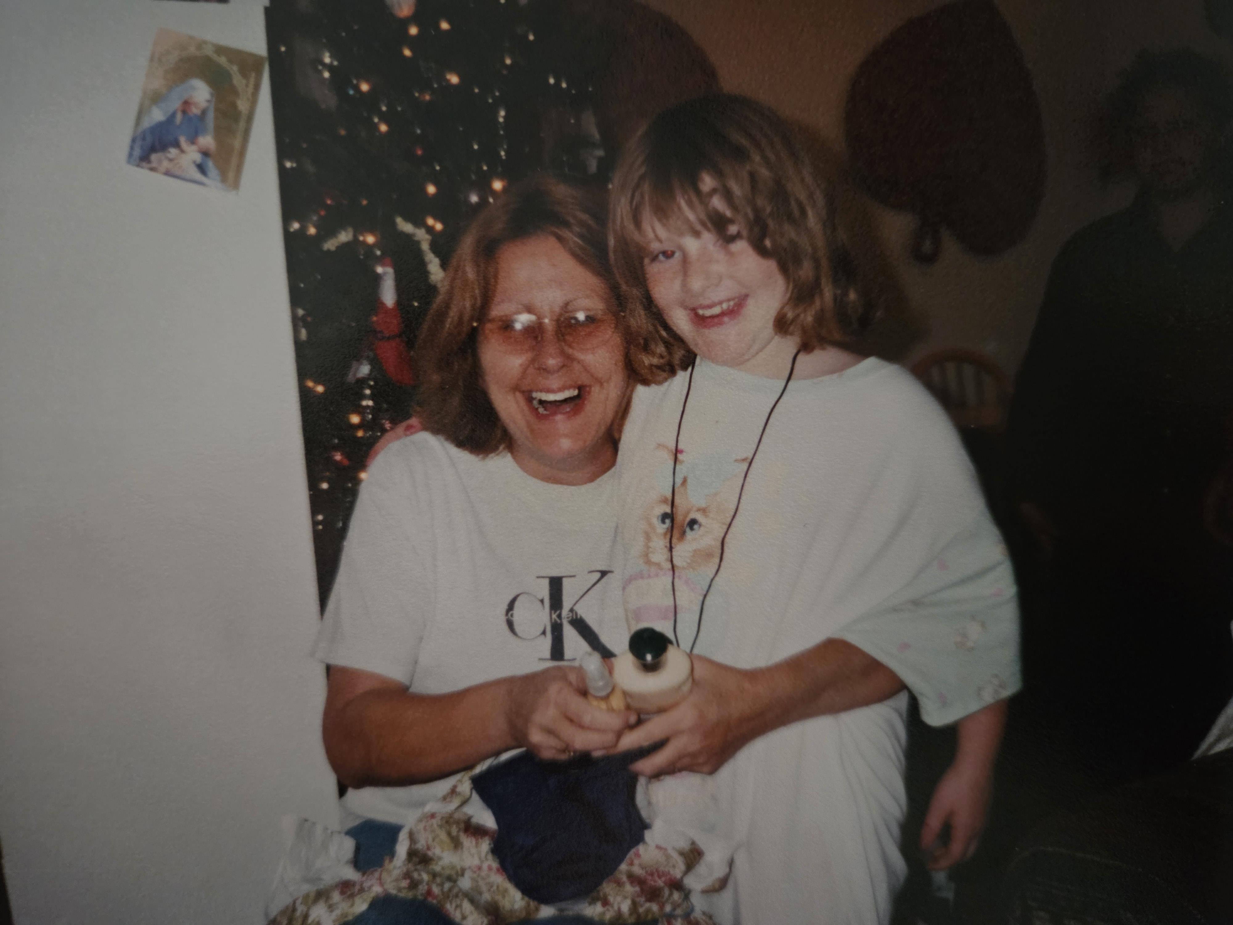 A woman and child smiling