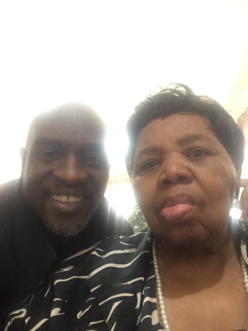 A man and woman taking a selfie