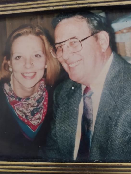 A man and woman smiling