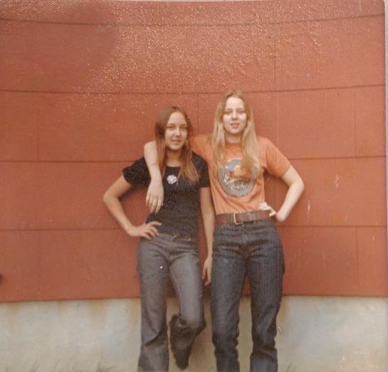 Two women standing next to each other