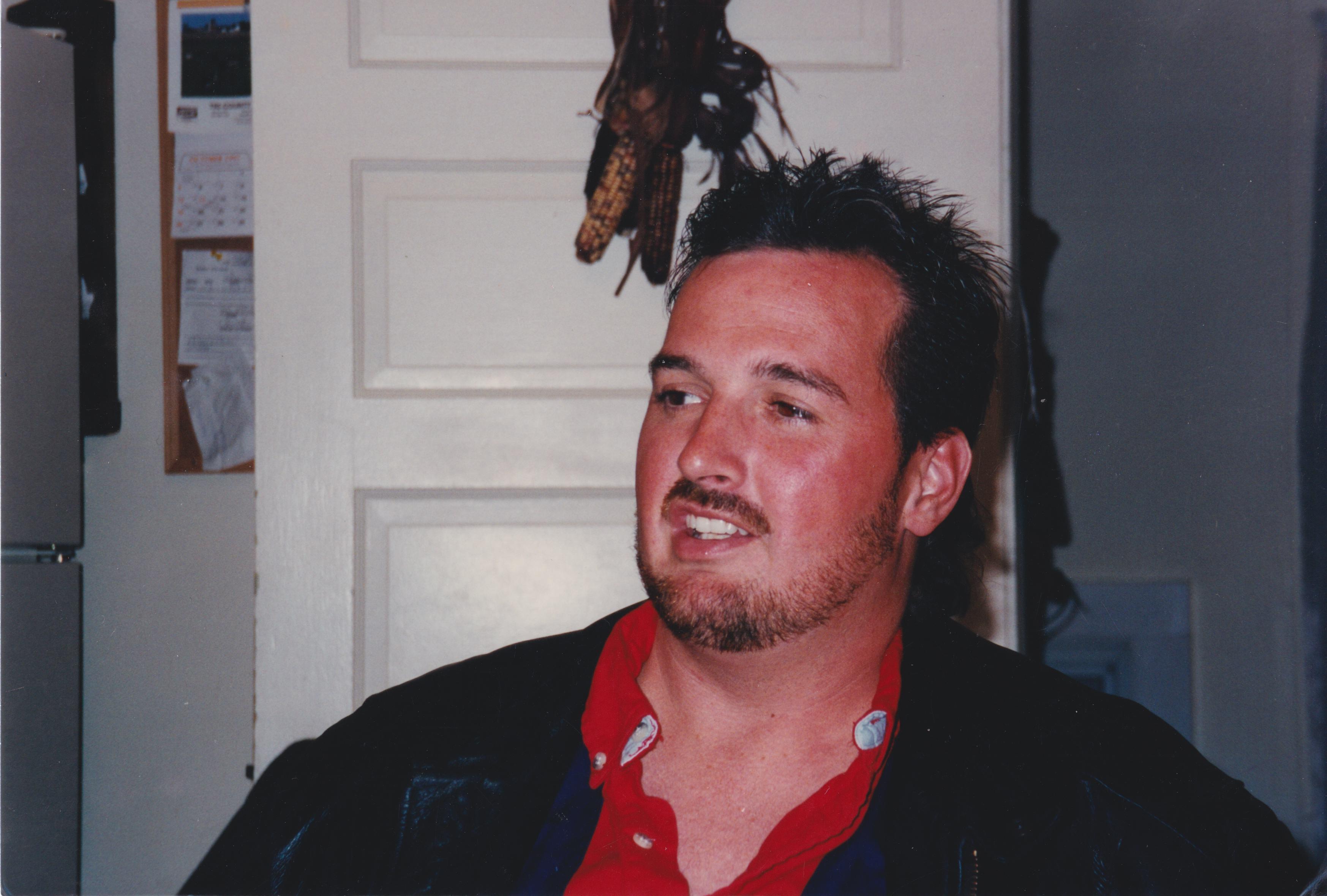 A man in a red shirt