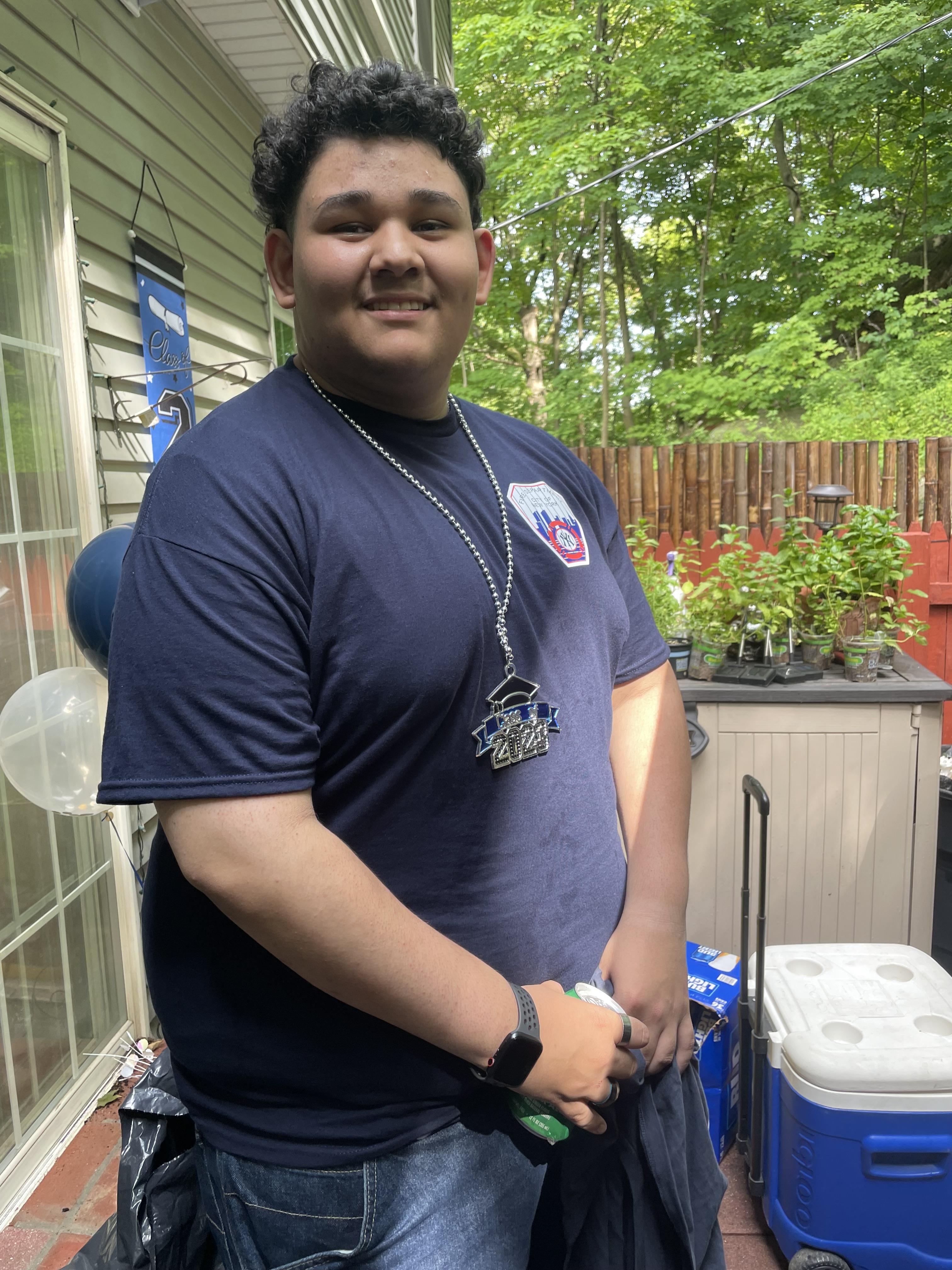 A man standing in a yard