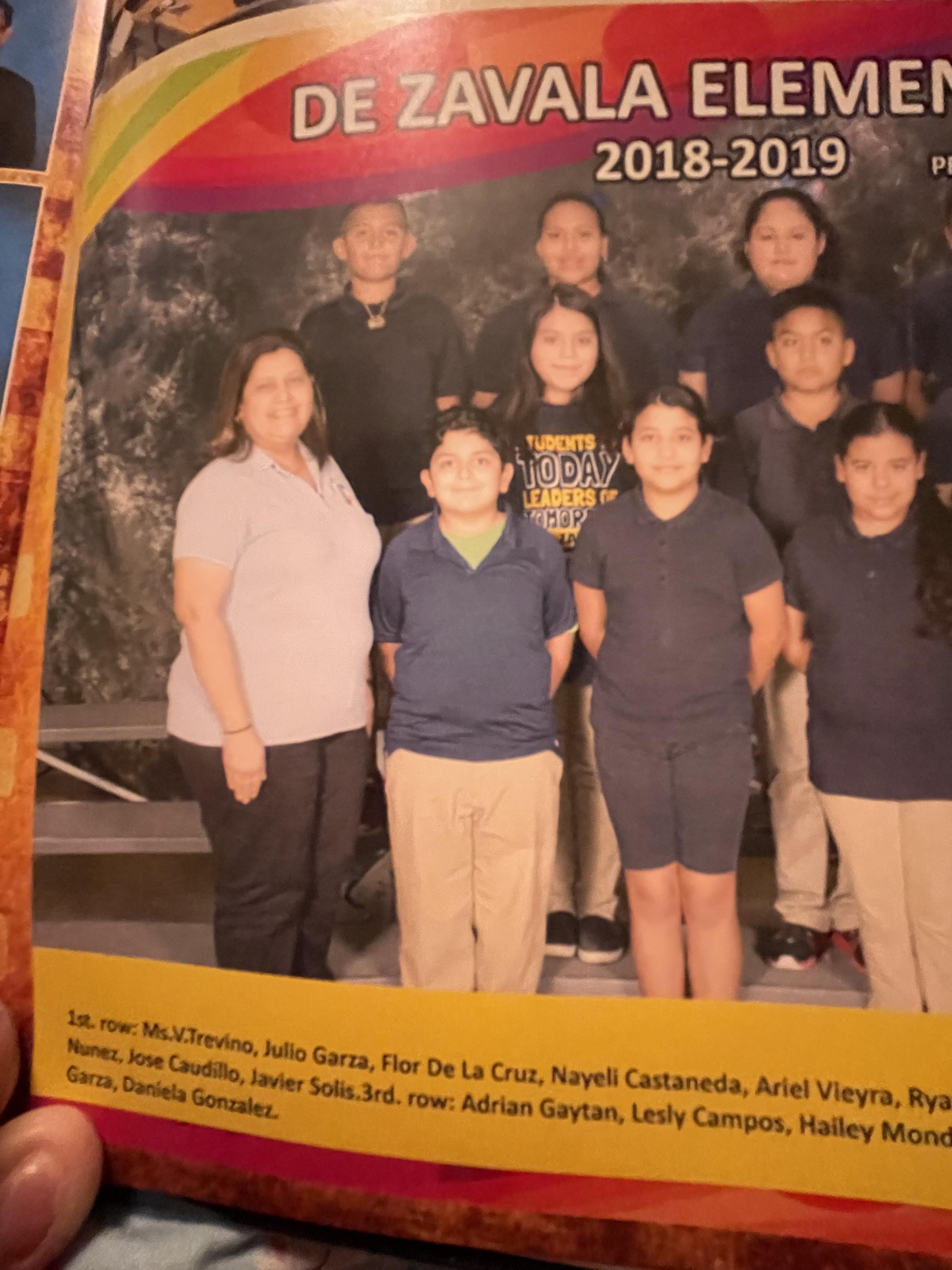 A group of children posing for a photo