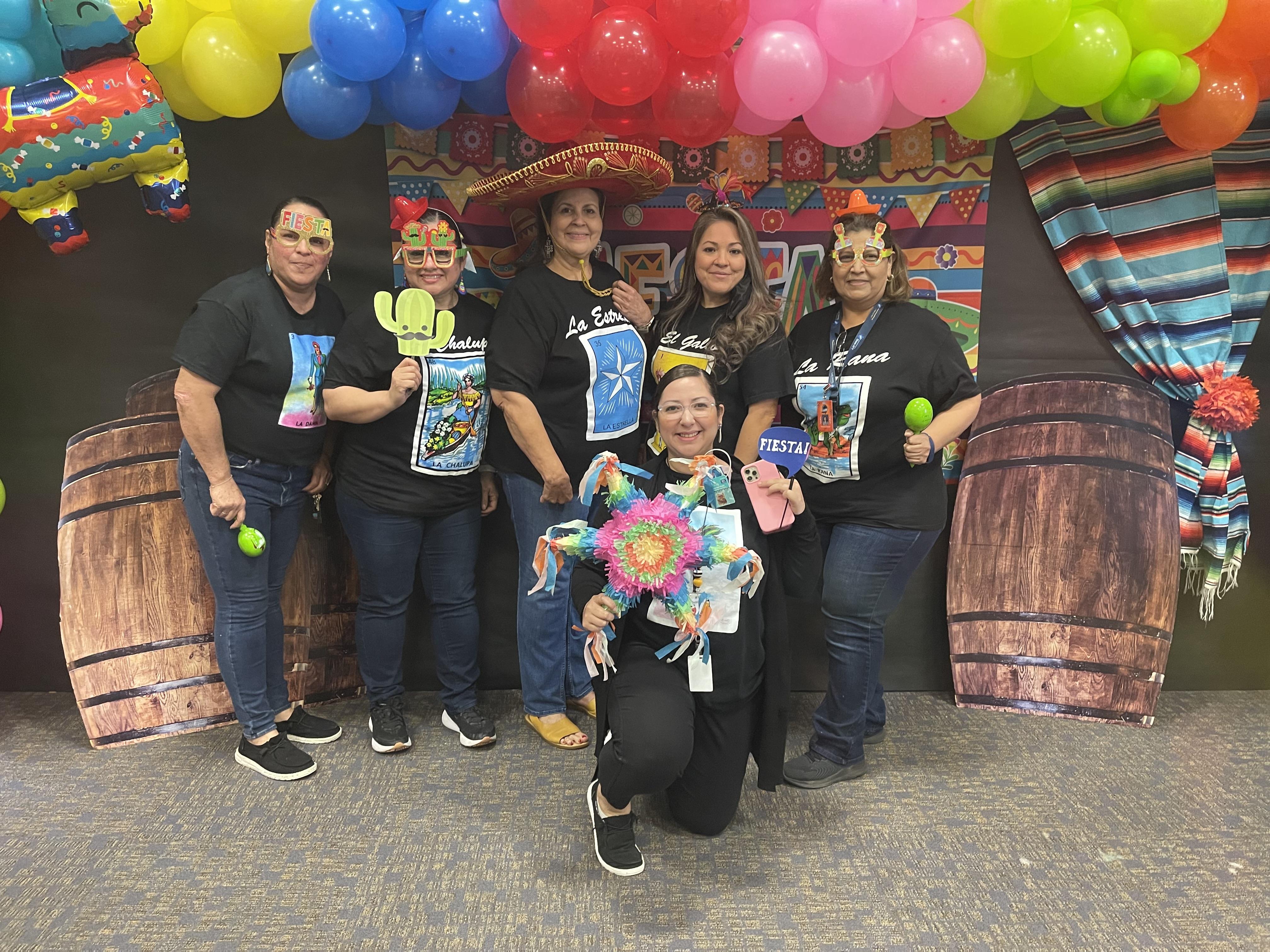 A group of people posing for a photo