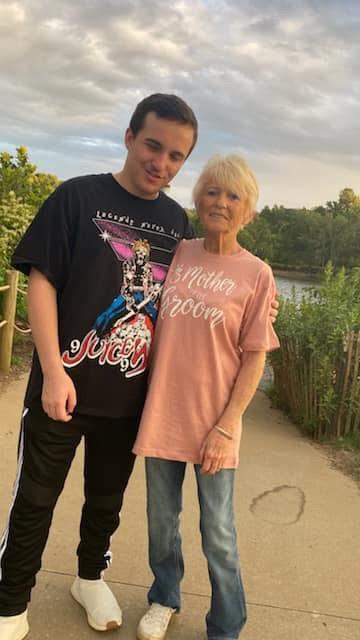 A man and woman posing for a picture