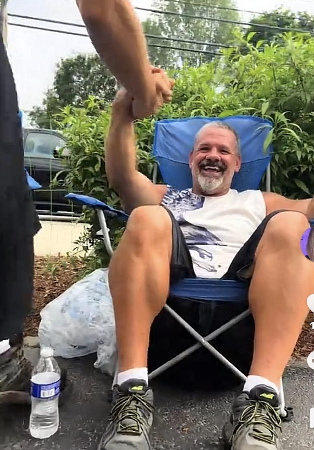 A man sitting in a chair