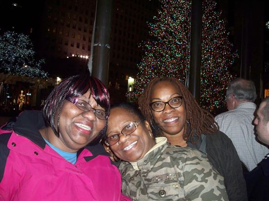 A group of women smiling at the camera