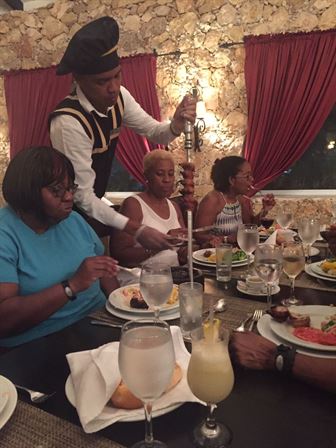 A group of people sitting at a table