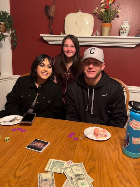 A group of people sitting at a table