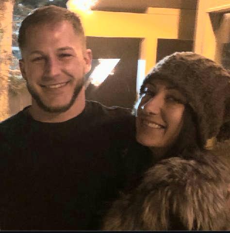 A man and woman smiling for a picture