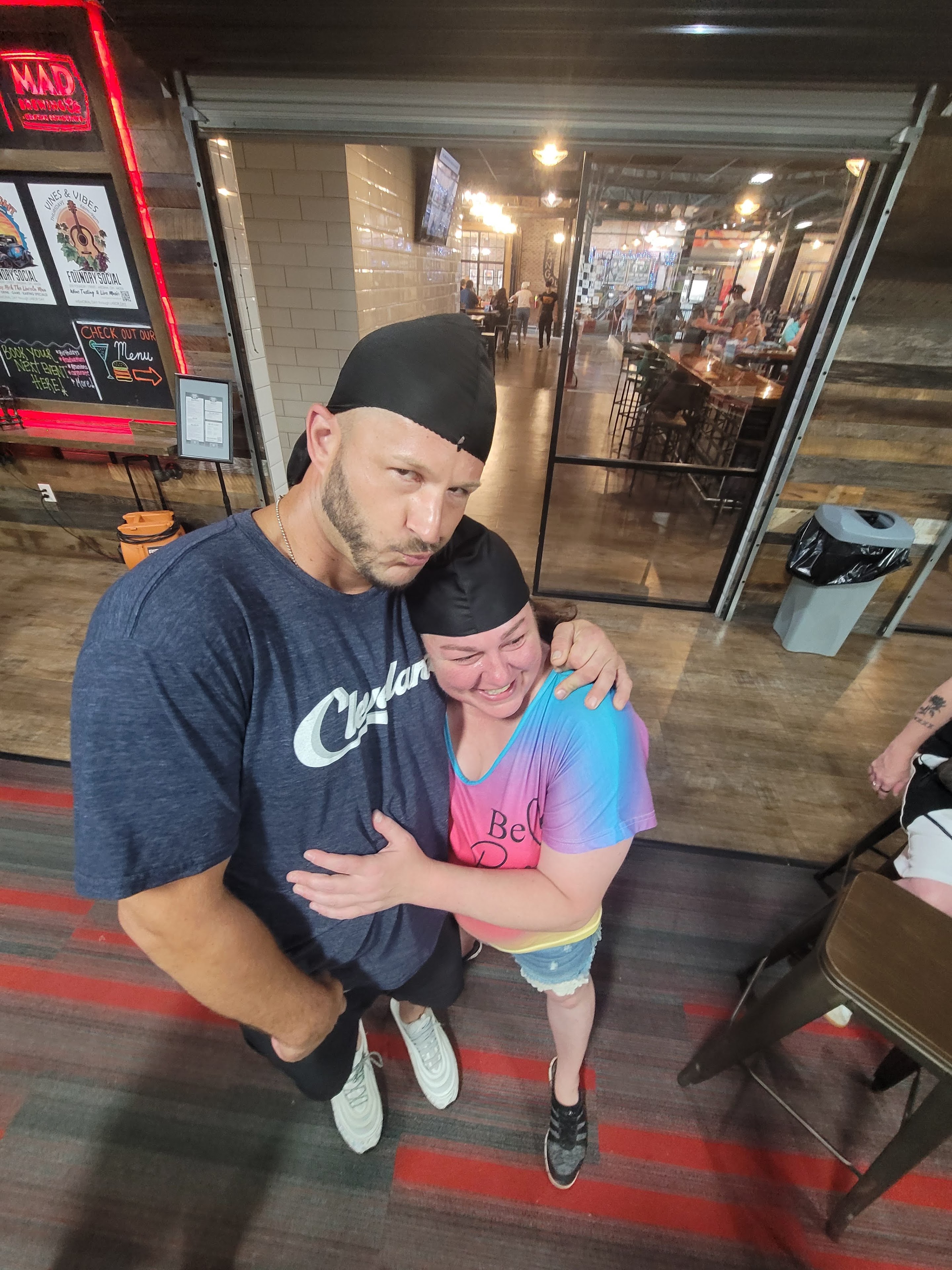 A man hugging a woman