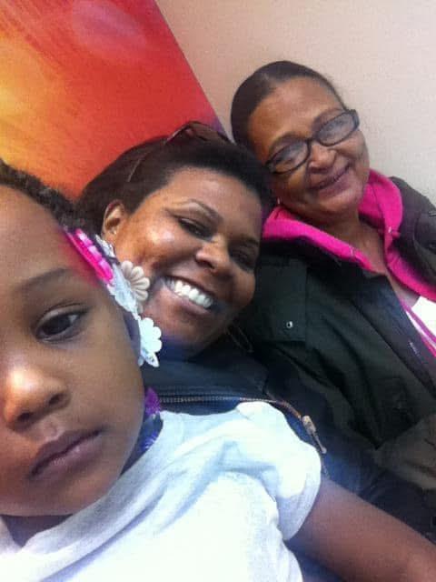 A group of people taking a selfie