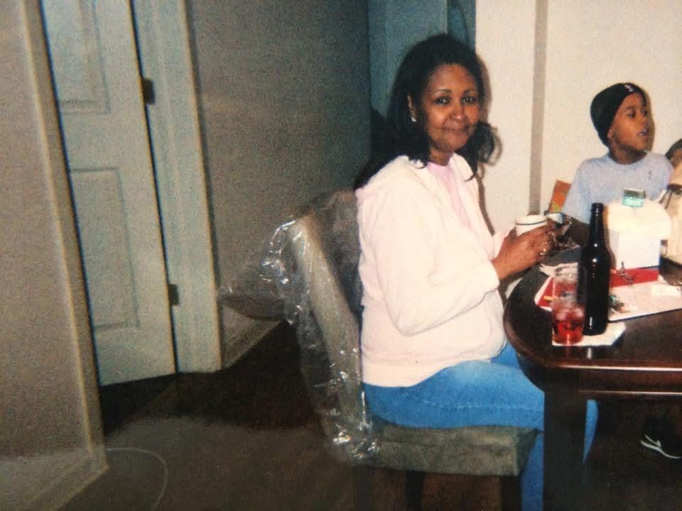 A woman sitting at a table