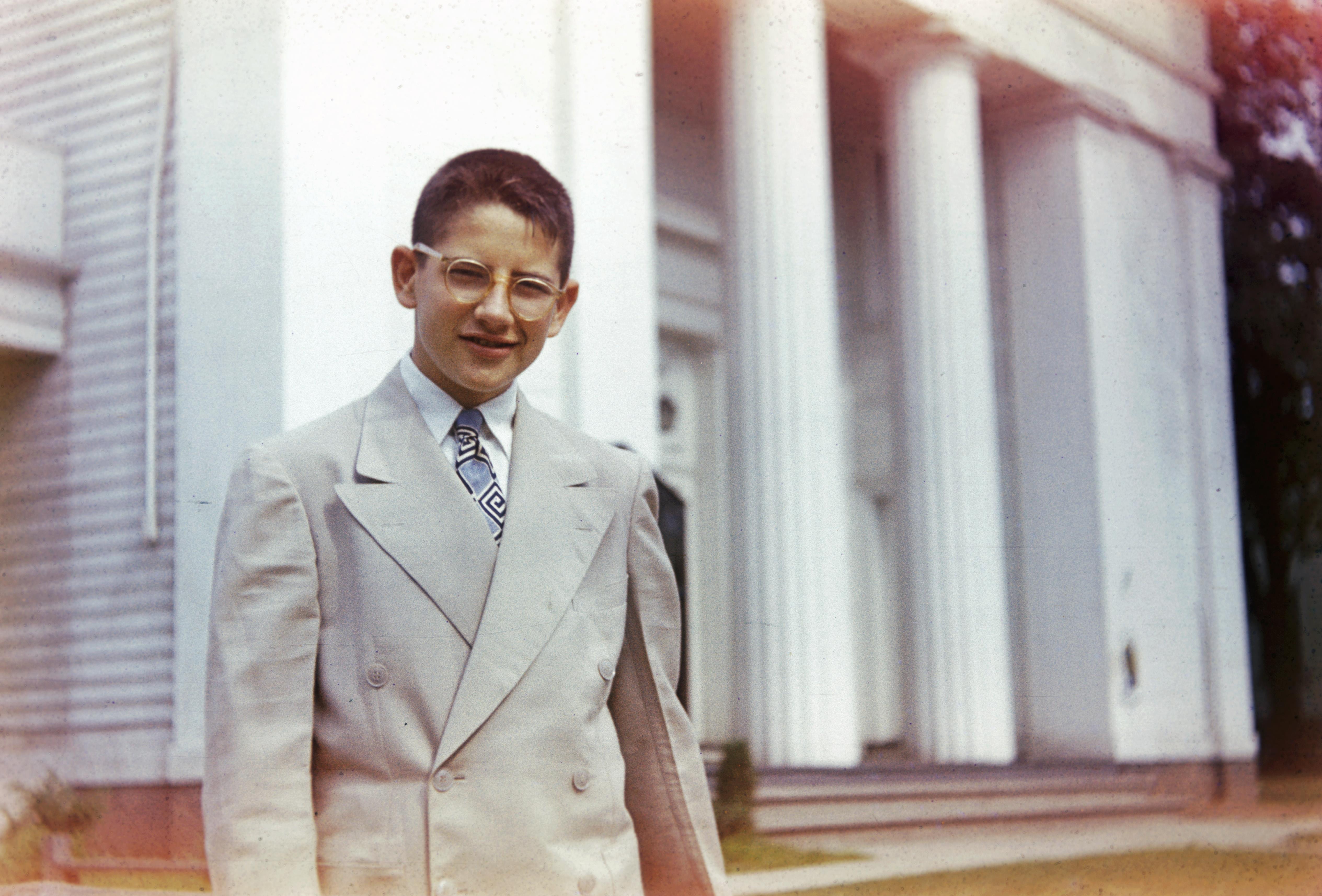 A boy in a suit and tie