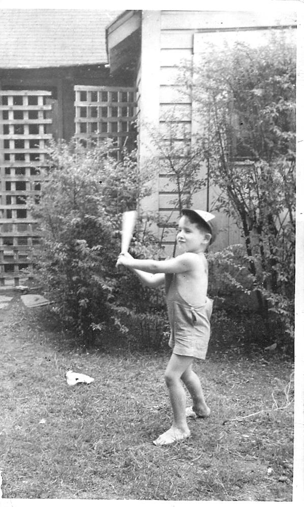 A boy holding a bat