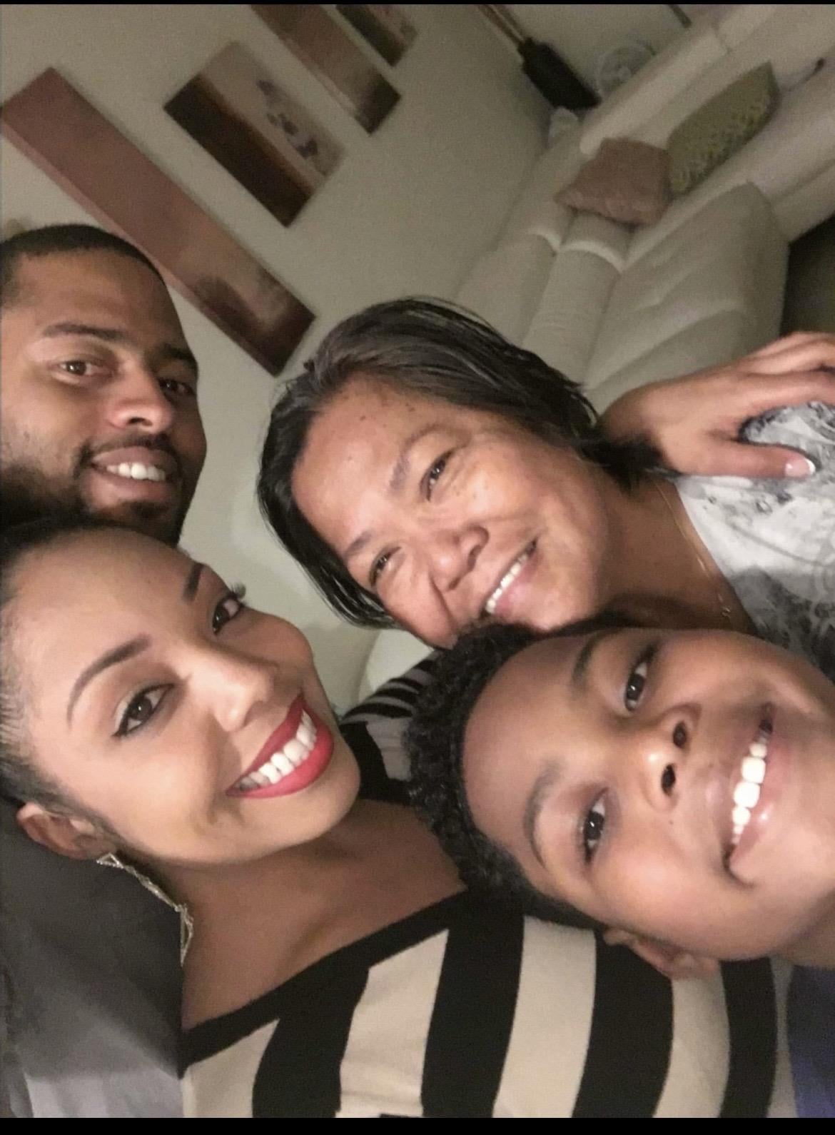 A group of people posing for a selfie