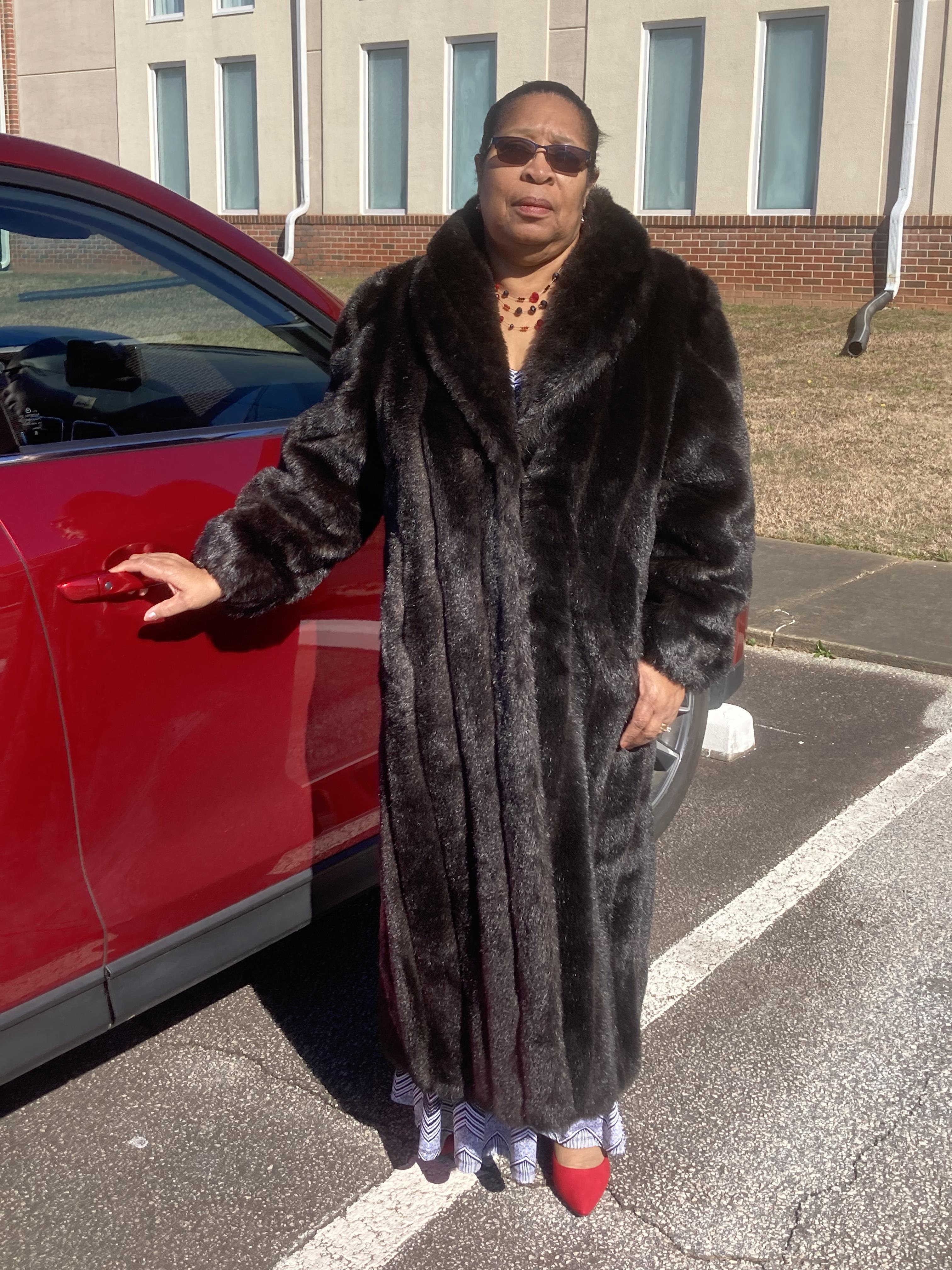 A woman in a fur coat
