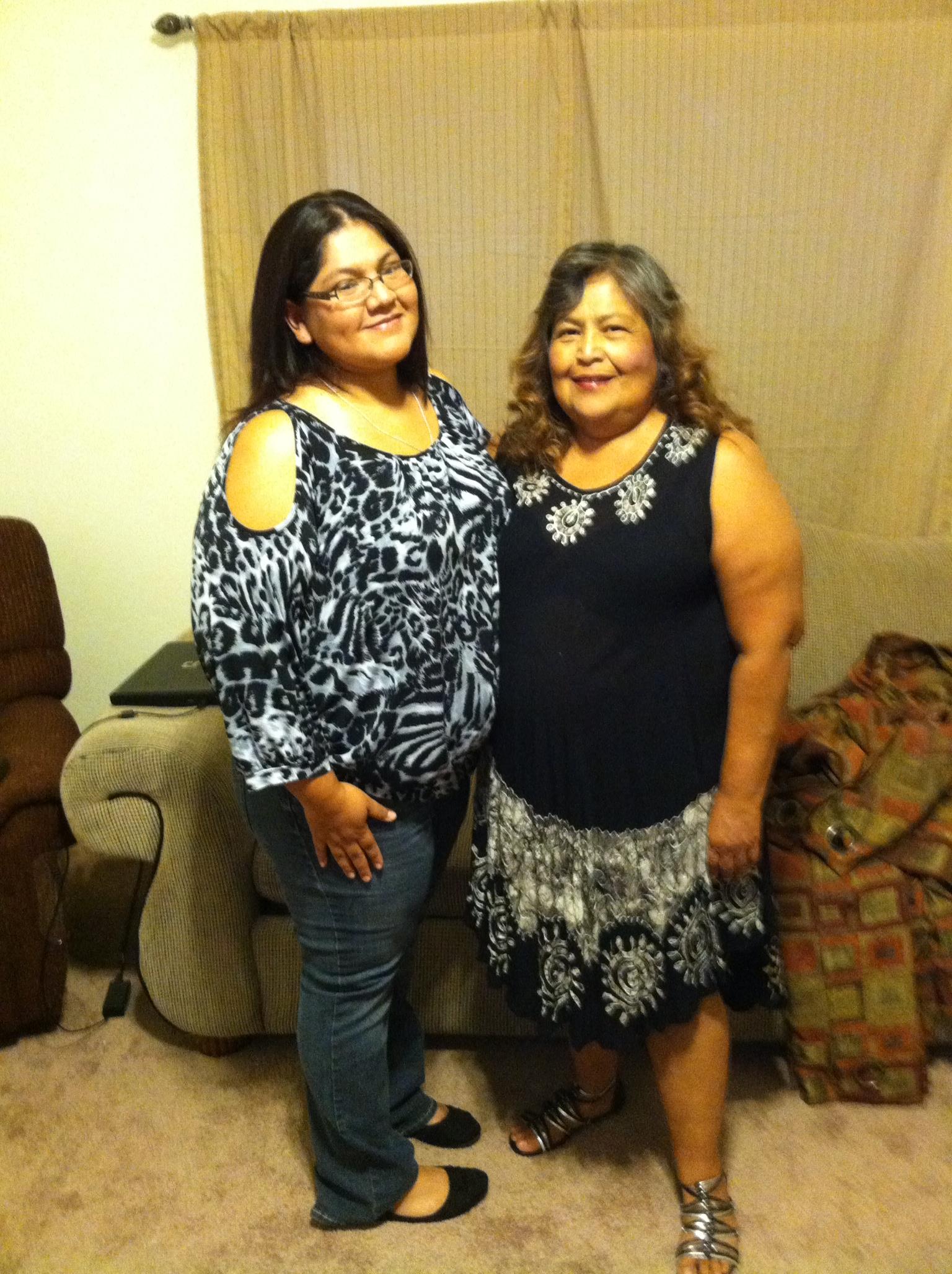 Two women standing next to each other