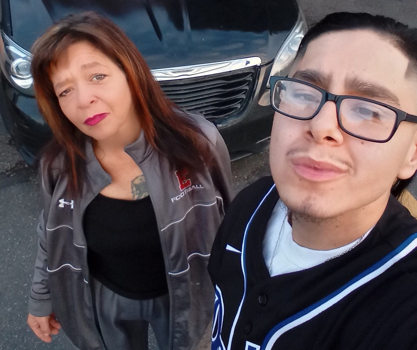 A man and woman taking a selfie