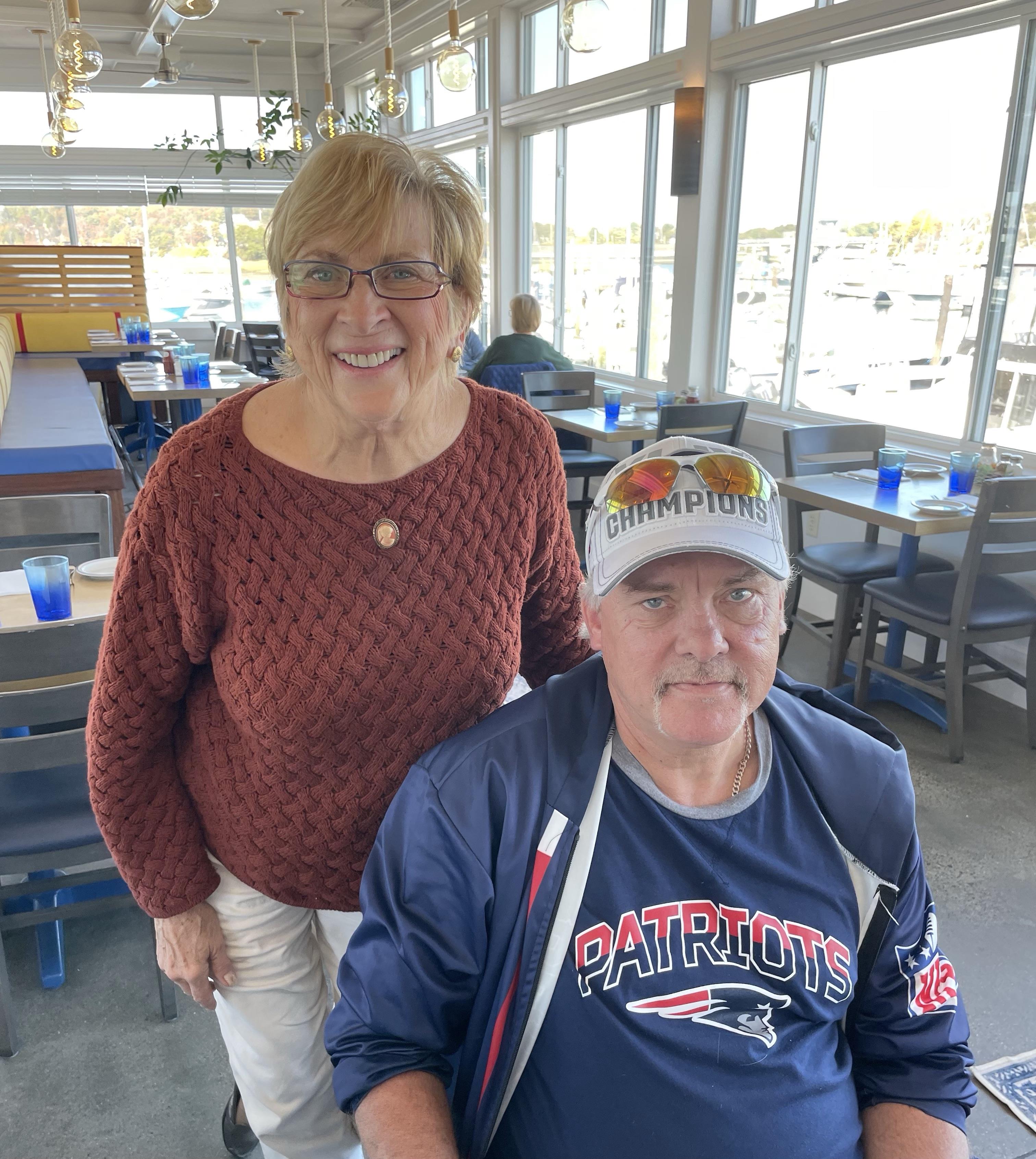 A man and woman standing next to each other