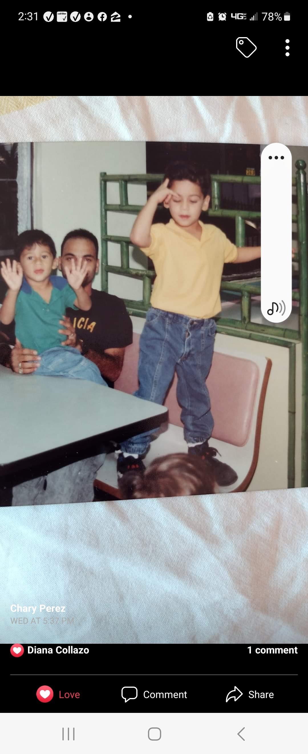 A man and two children posing for a picture