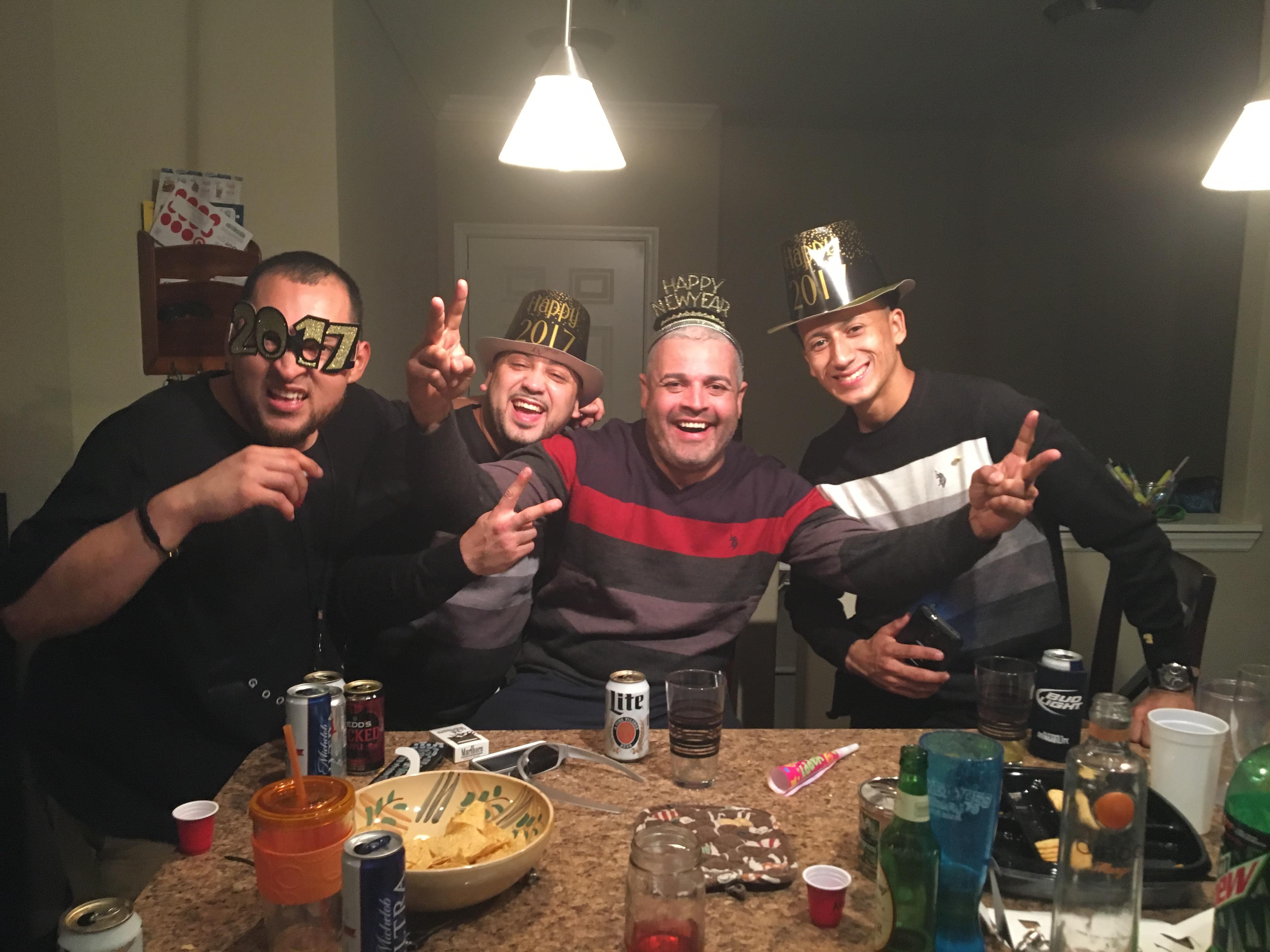 A group of men posing for a picture
