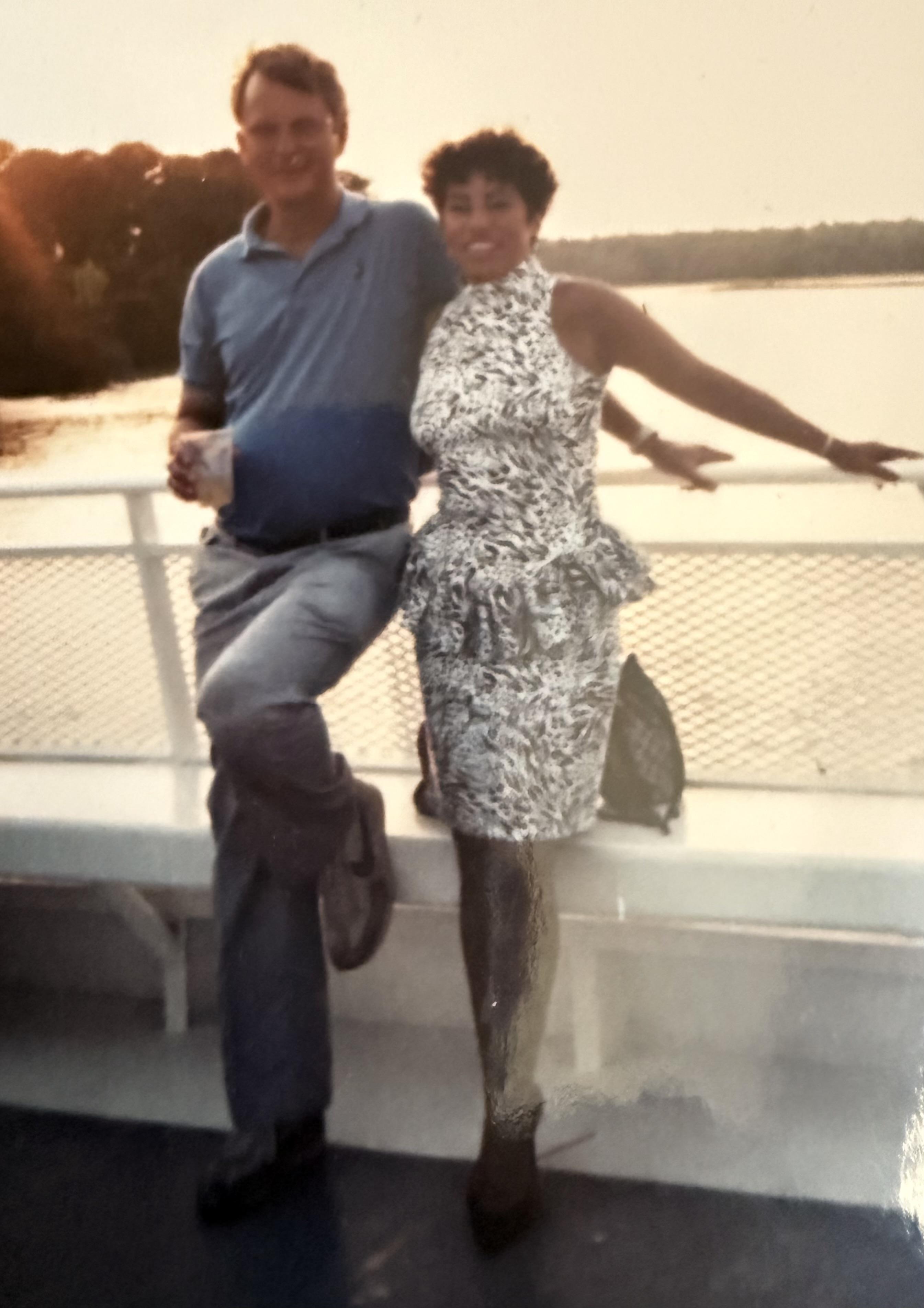 A man and woman posing for a picture
