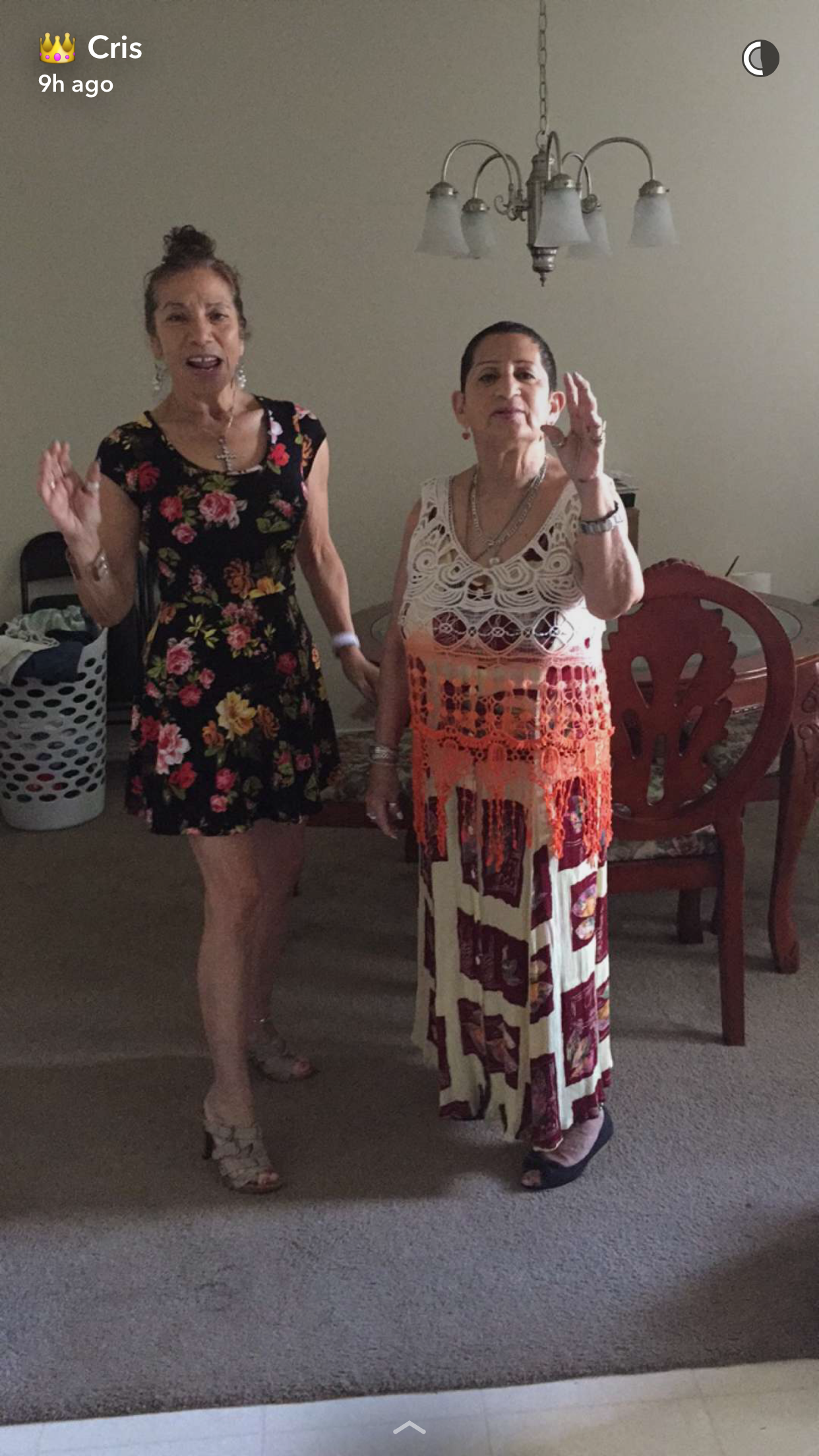 Two women standing in a room