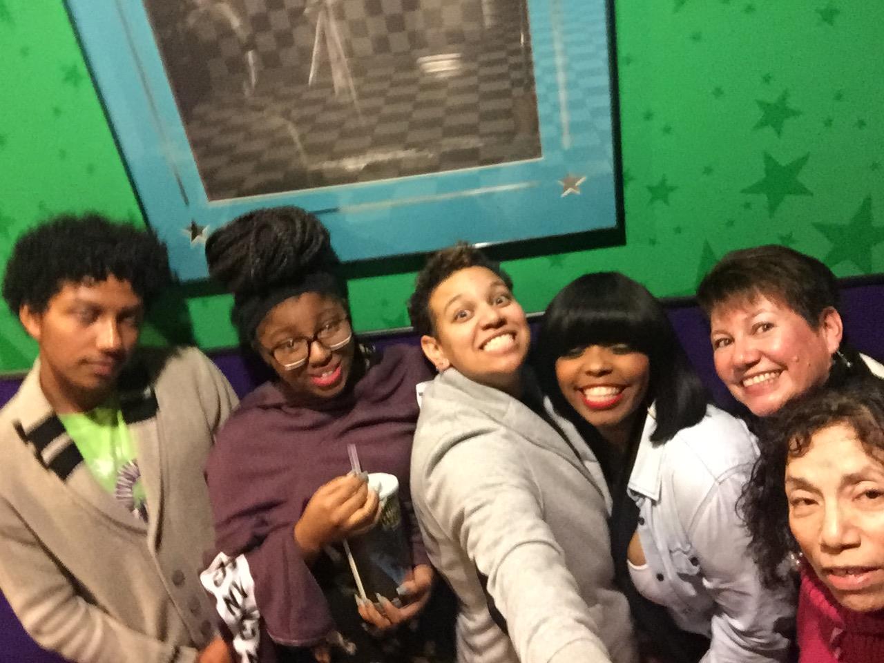 A group of people posing for a selfie