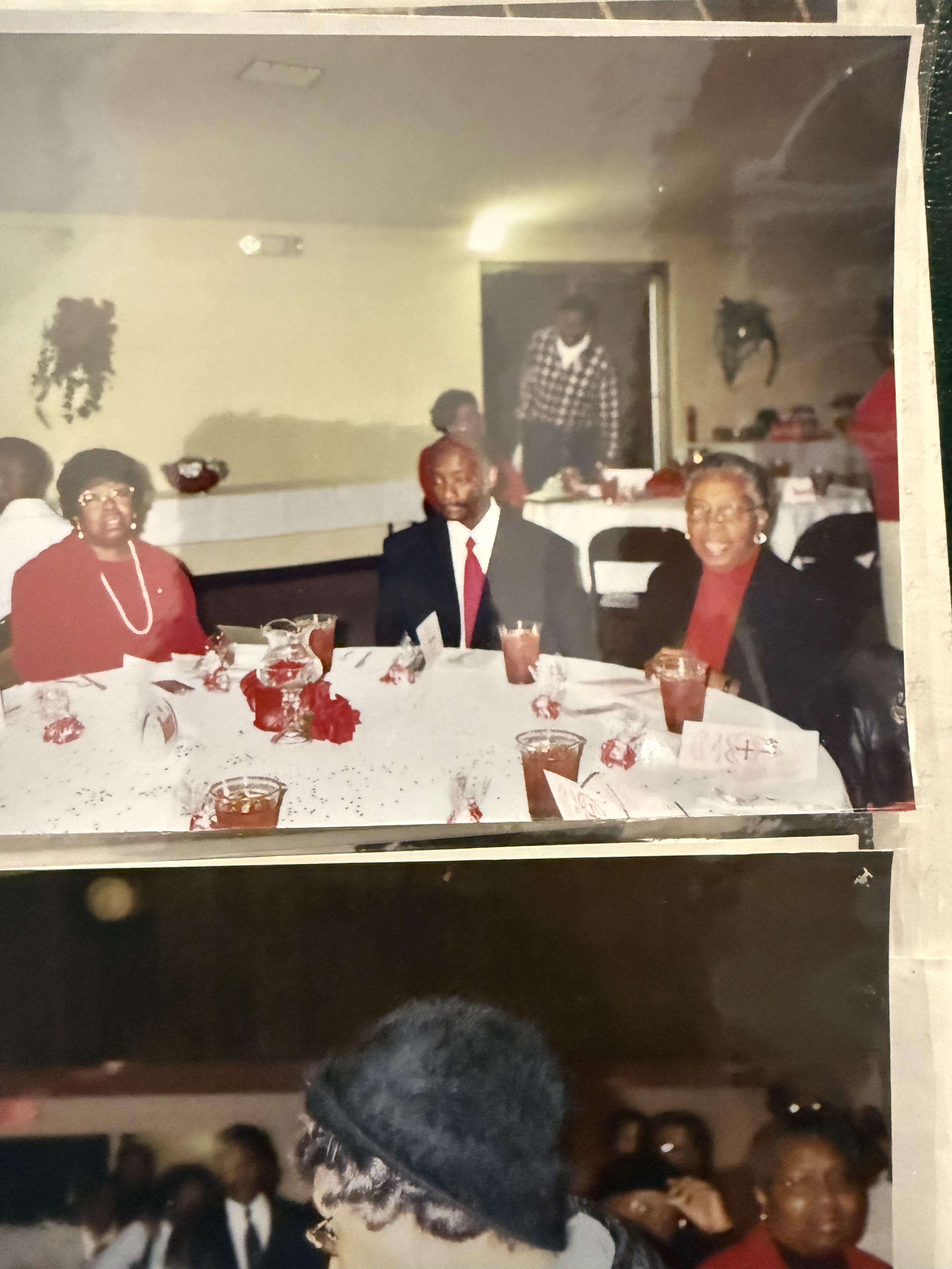 A group of people sitting at a table