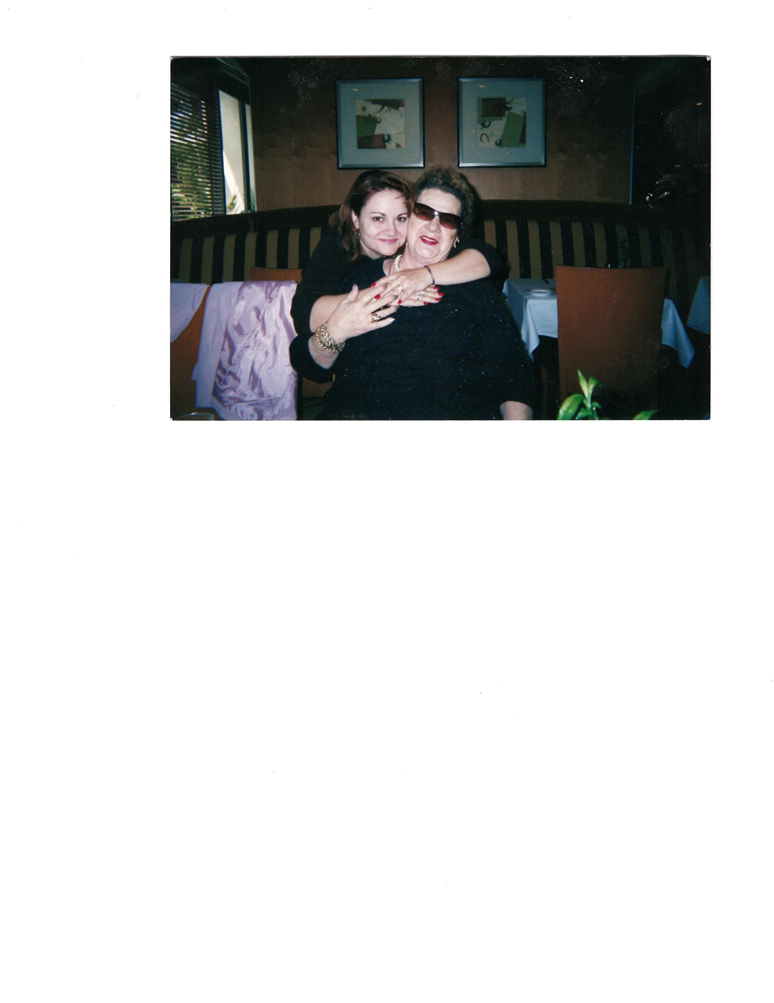 A woman hugging another woman