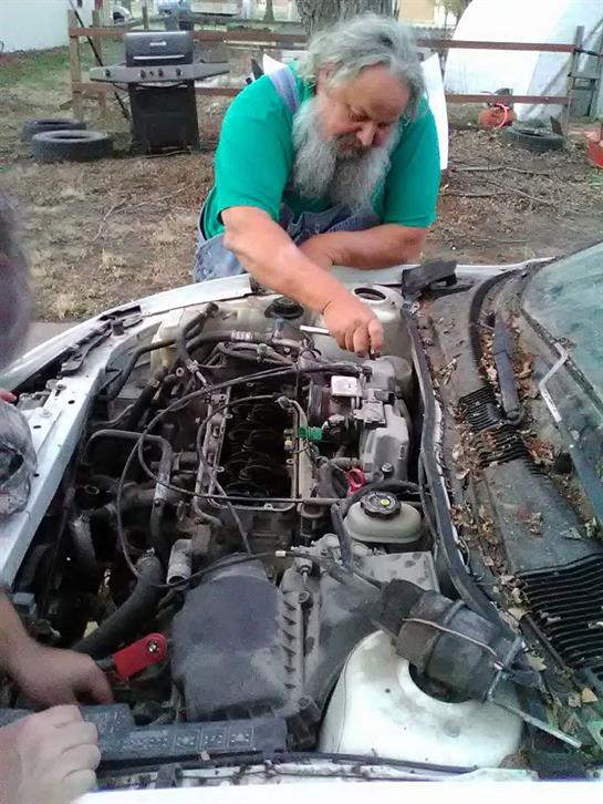 A man working on a car