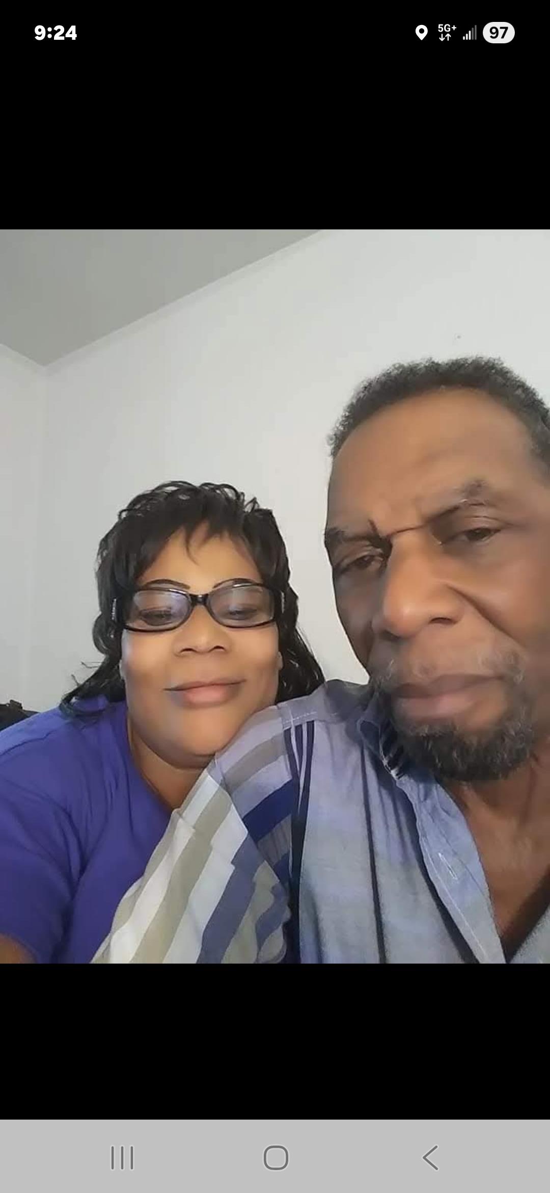 A man and woman taking a selfie