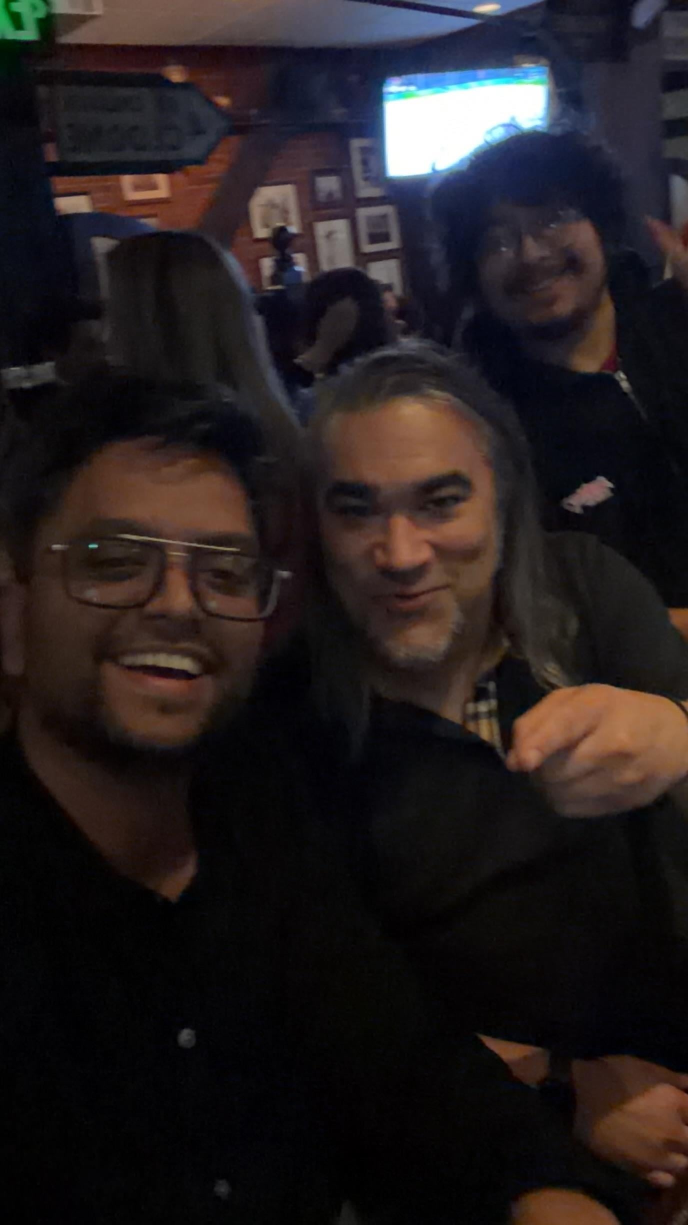 A group of men taking a selfie