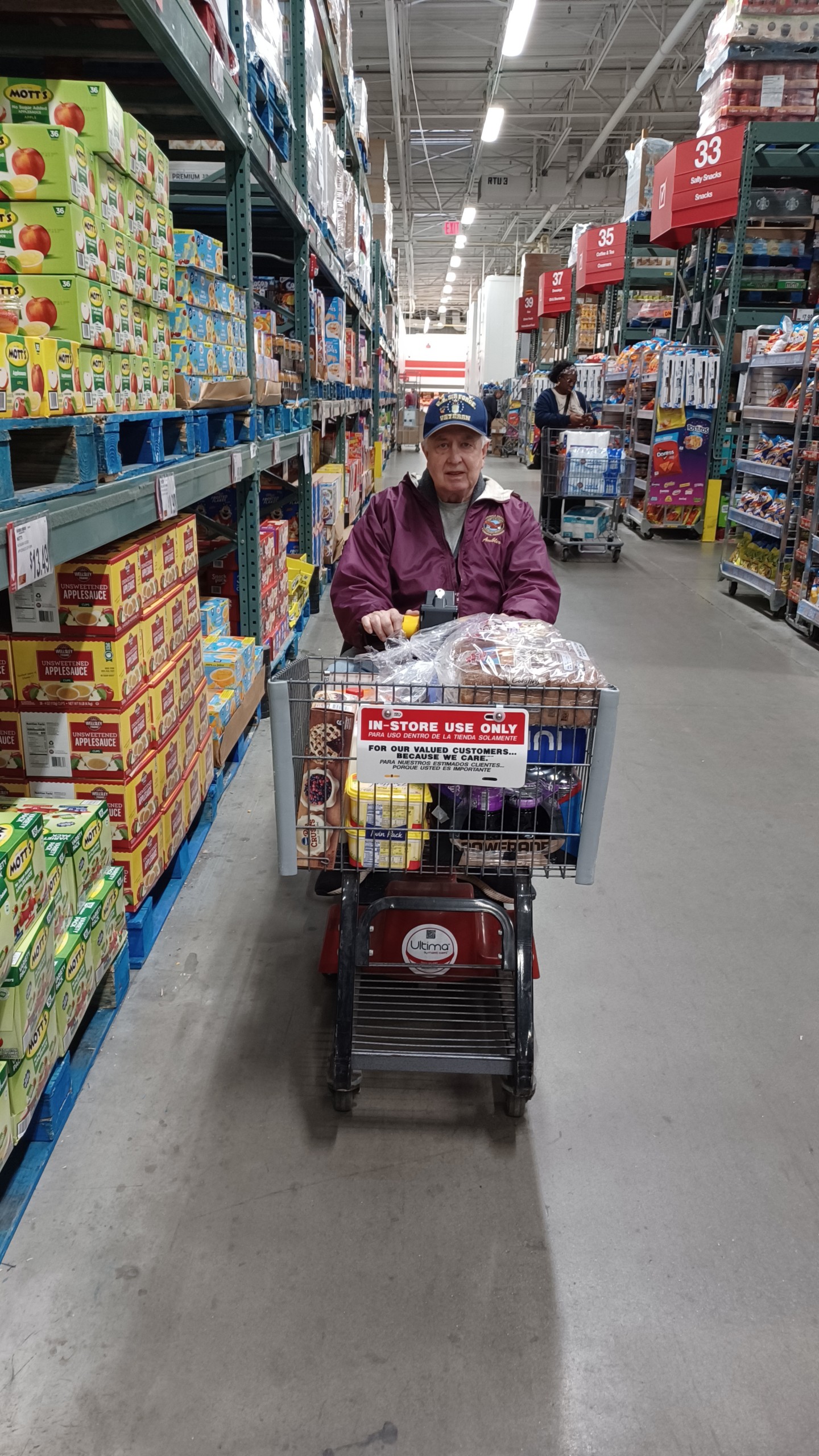 A man in a shopping cart