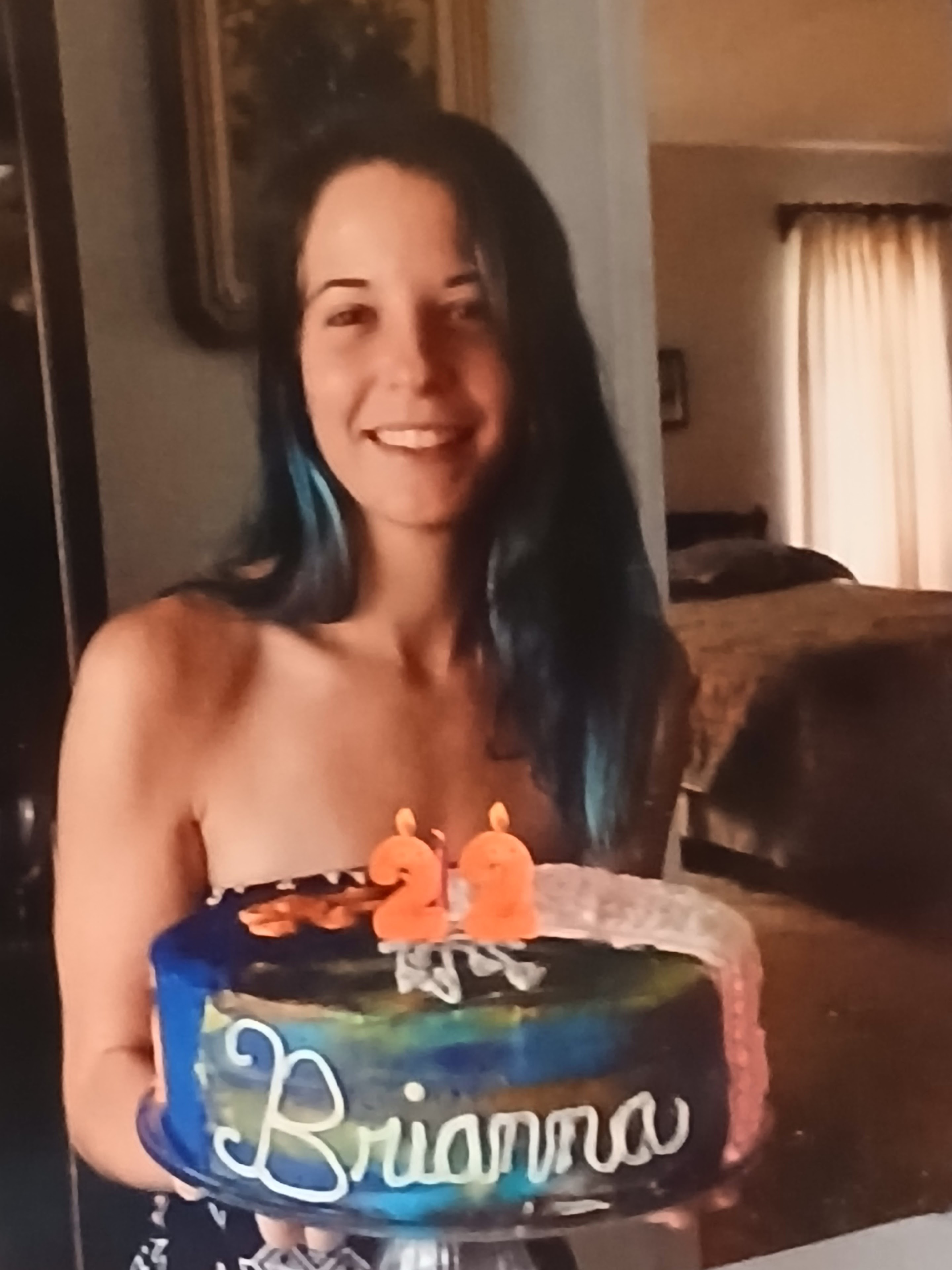 A woman smiling at camera