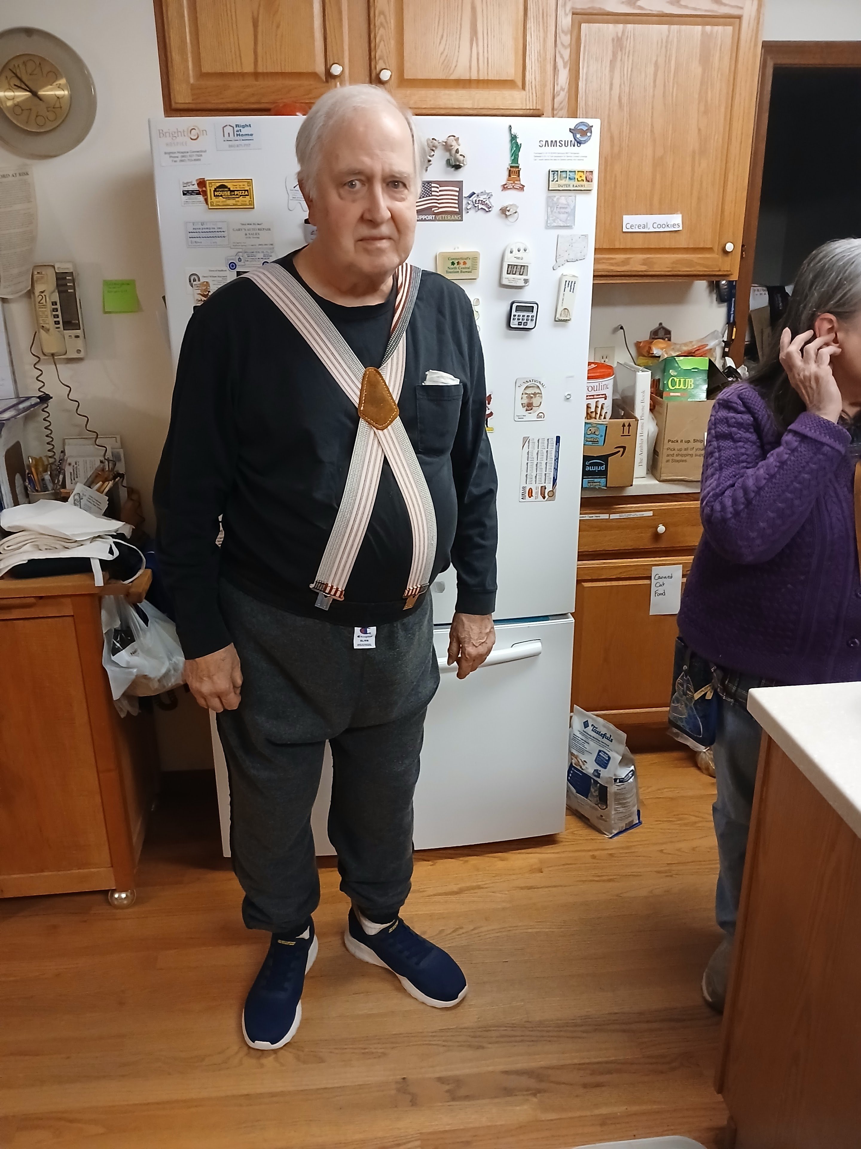 A man standing in a kitchen