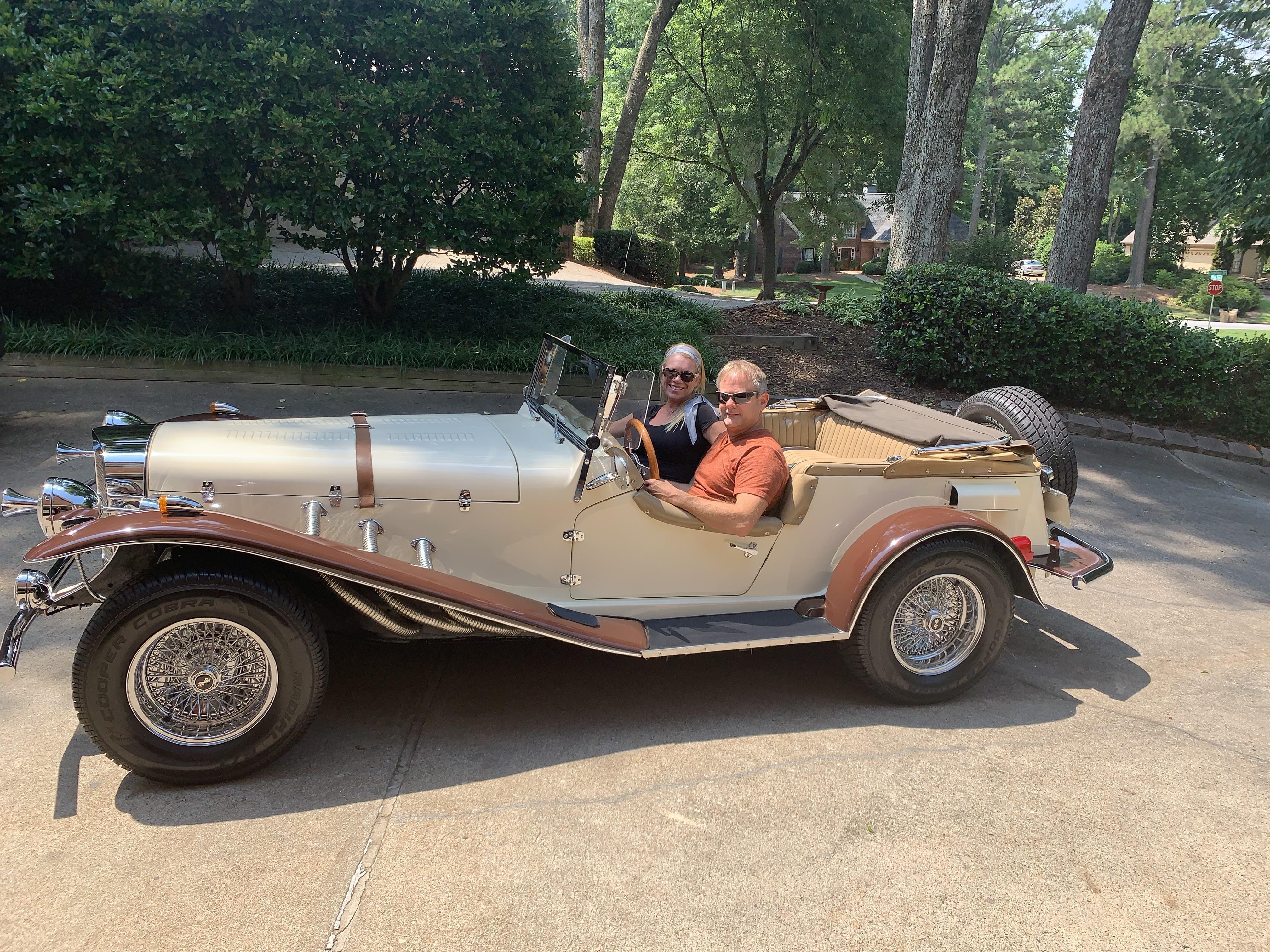 A couple of people in a car