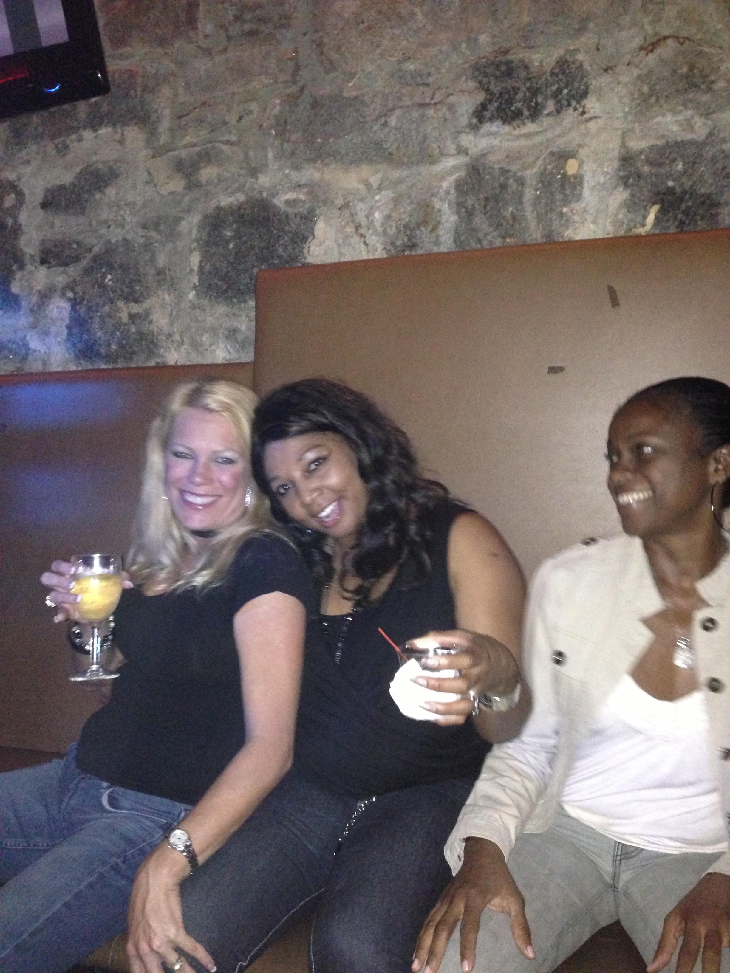 A group of women sitting on a couch