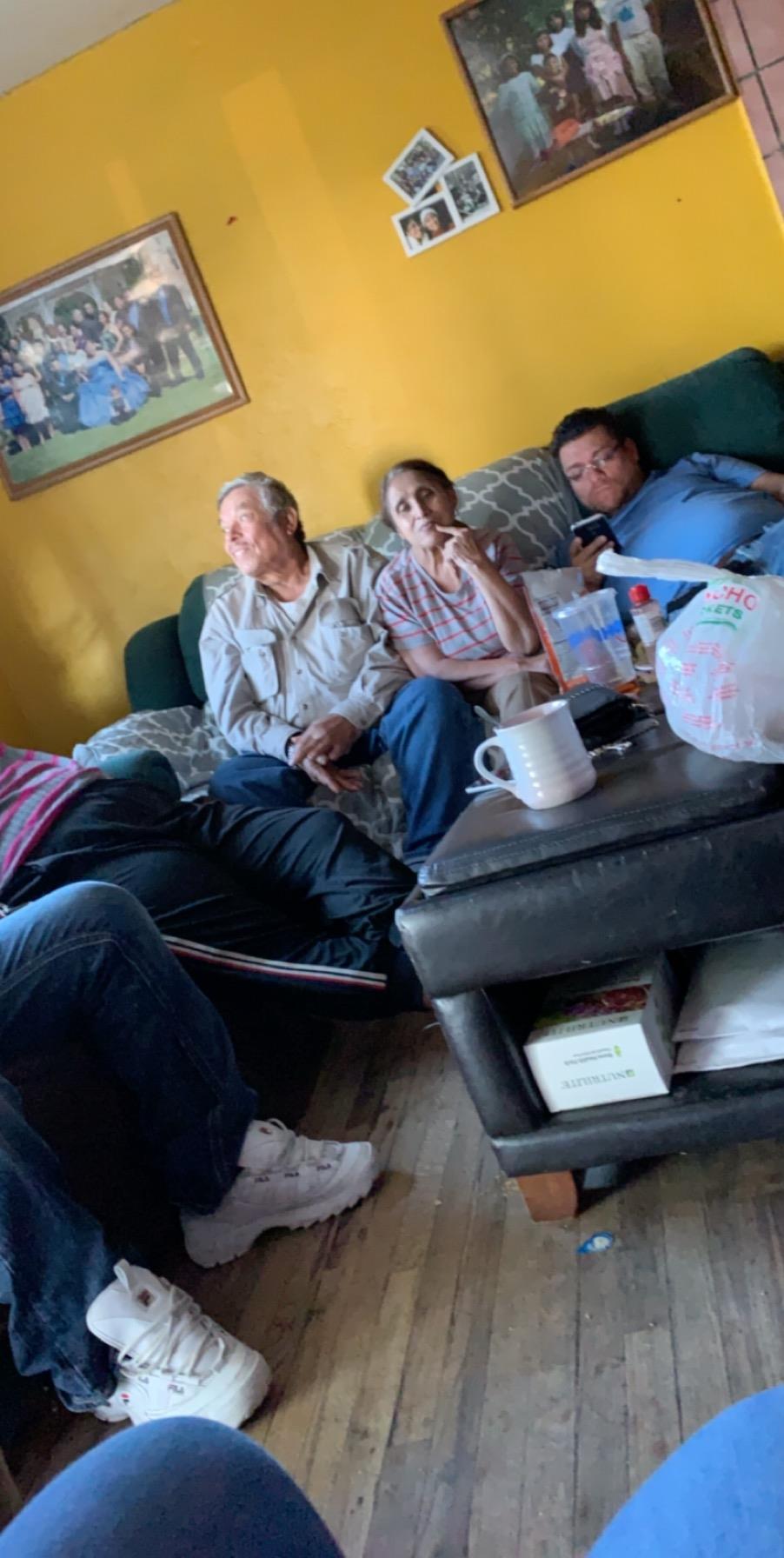 A group of people sitting on a couch