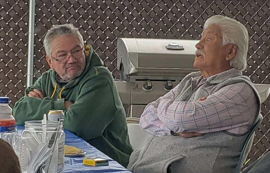 Two men sitting at a table