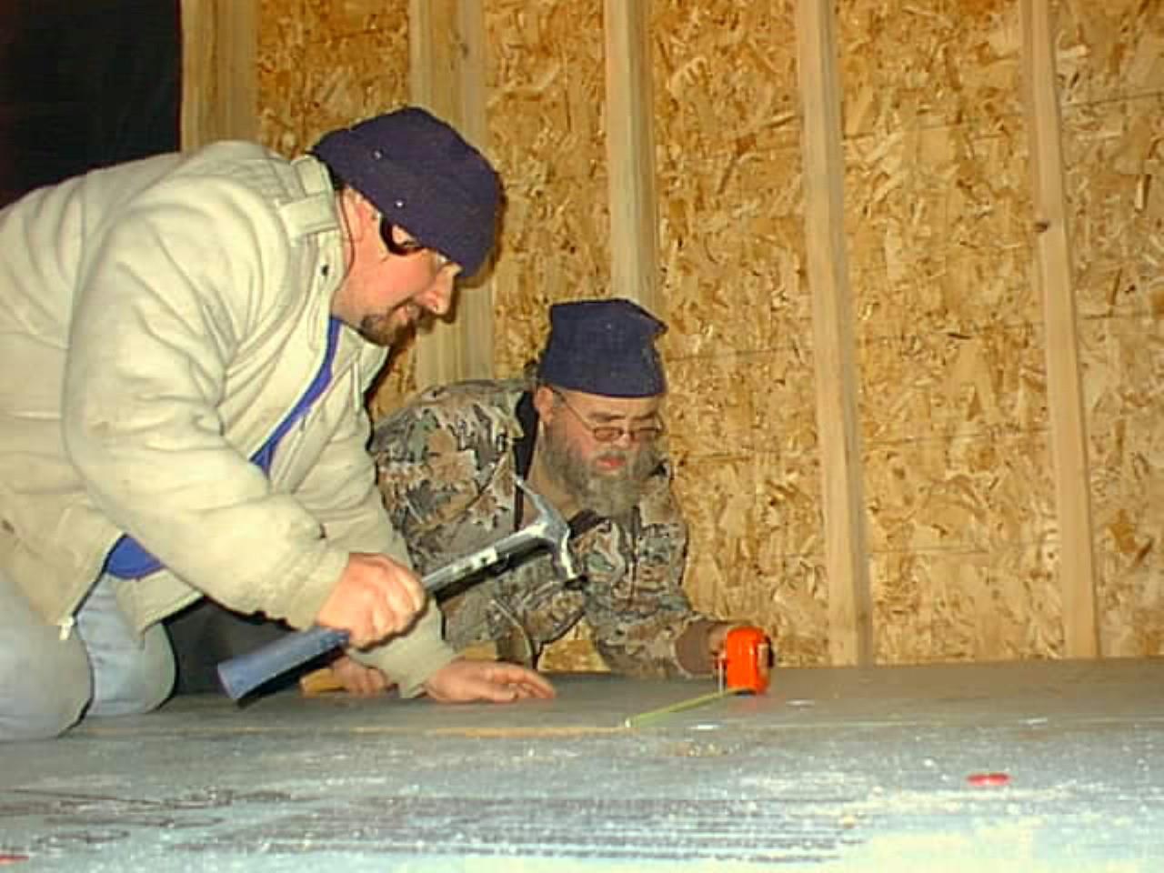 A group of men working on a project