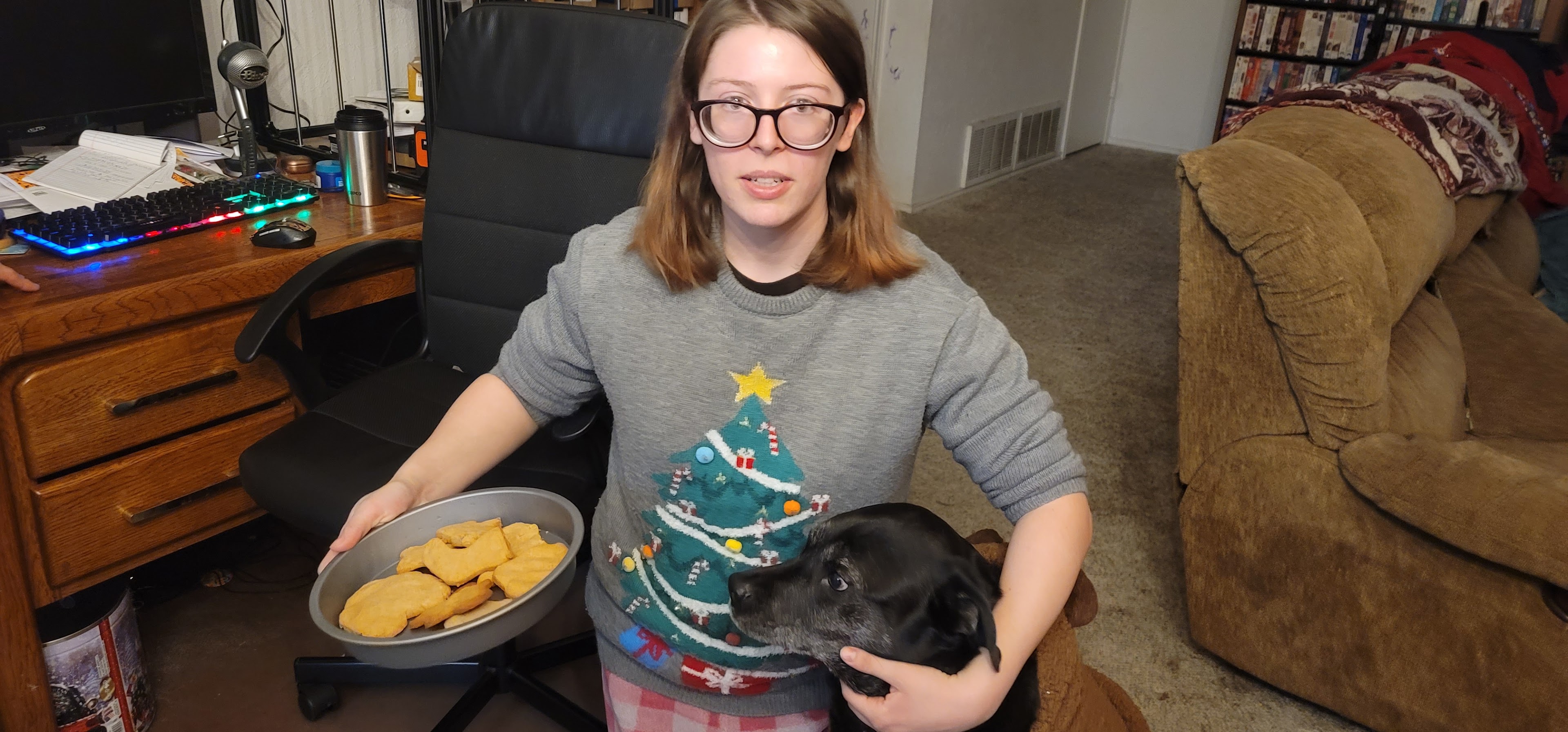 A woman holding a dog