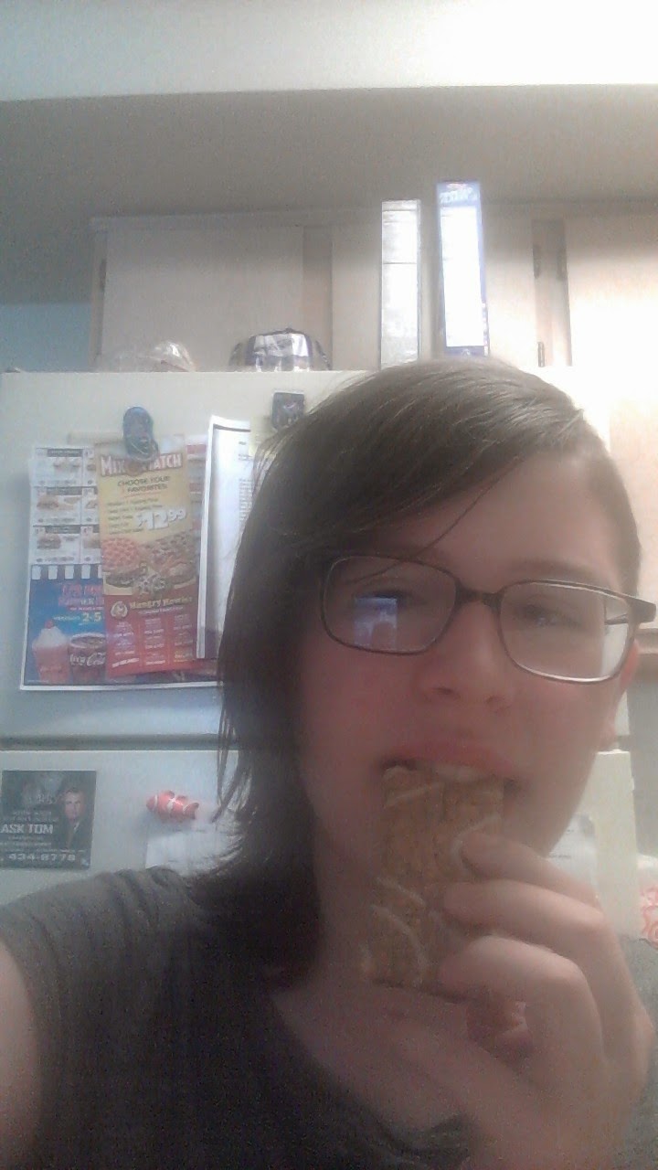 A person eating a cookie