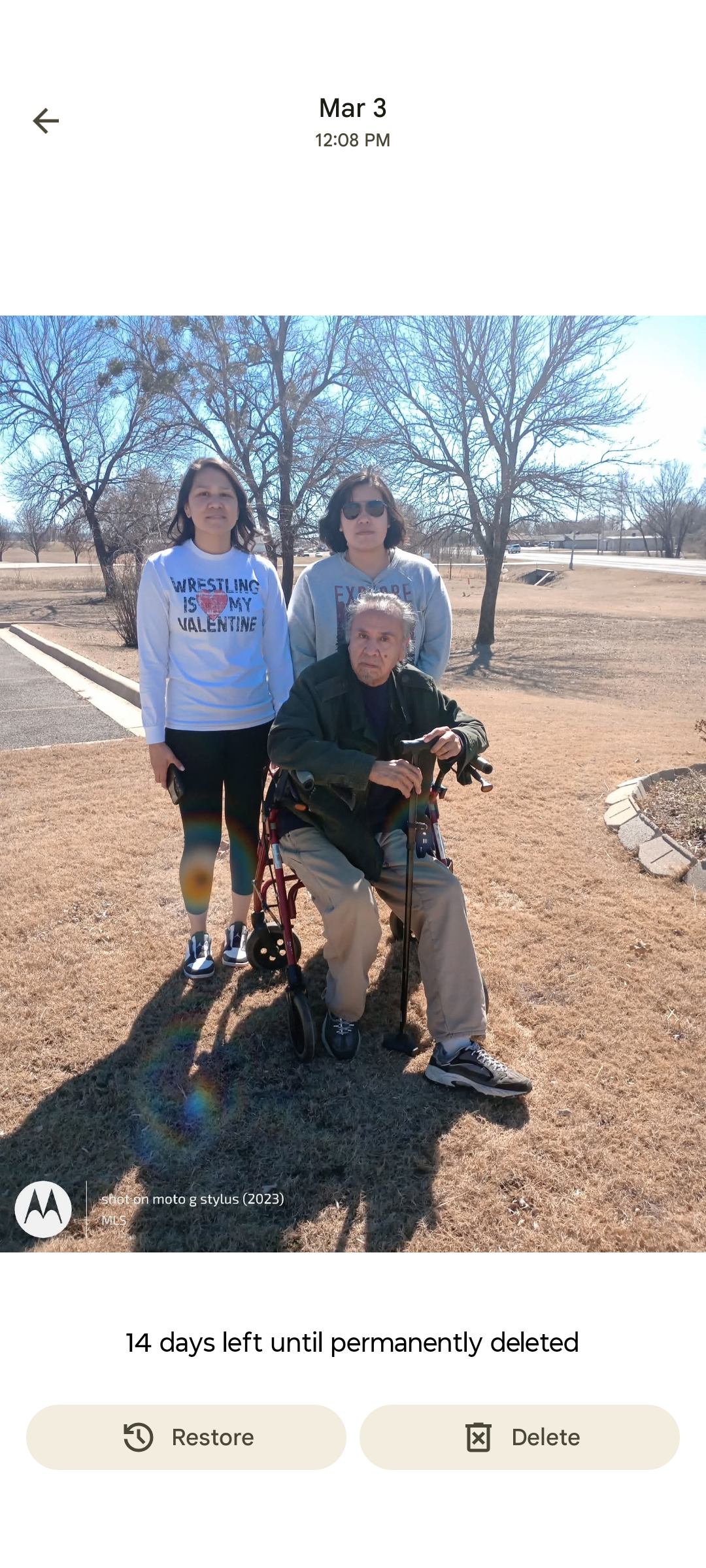 A group of people standing in a park