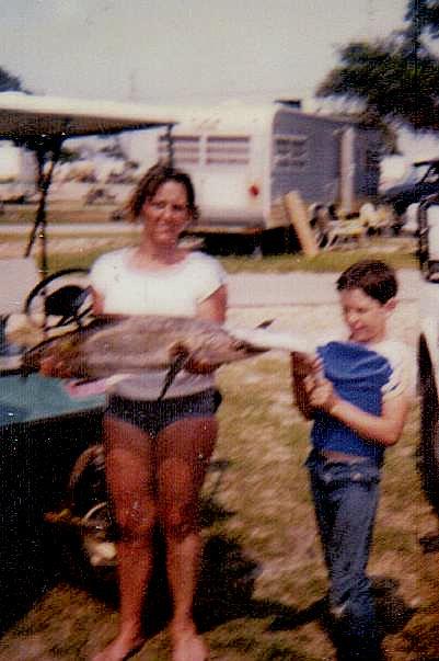 A woman holding a fish
