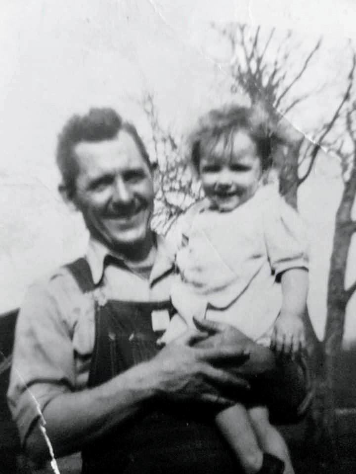 A man holding a baby