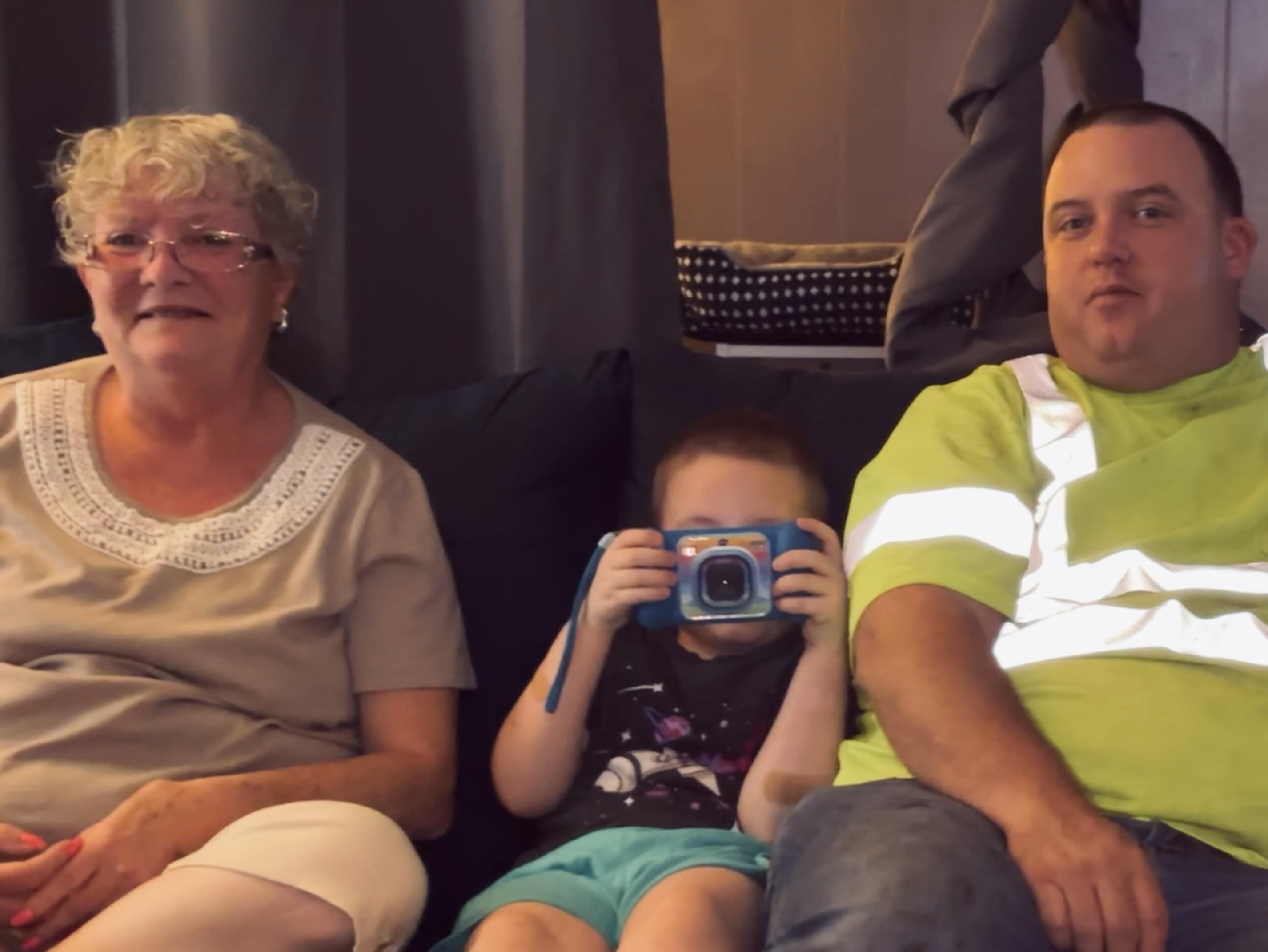 A group of people sitting on a couch
