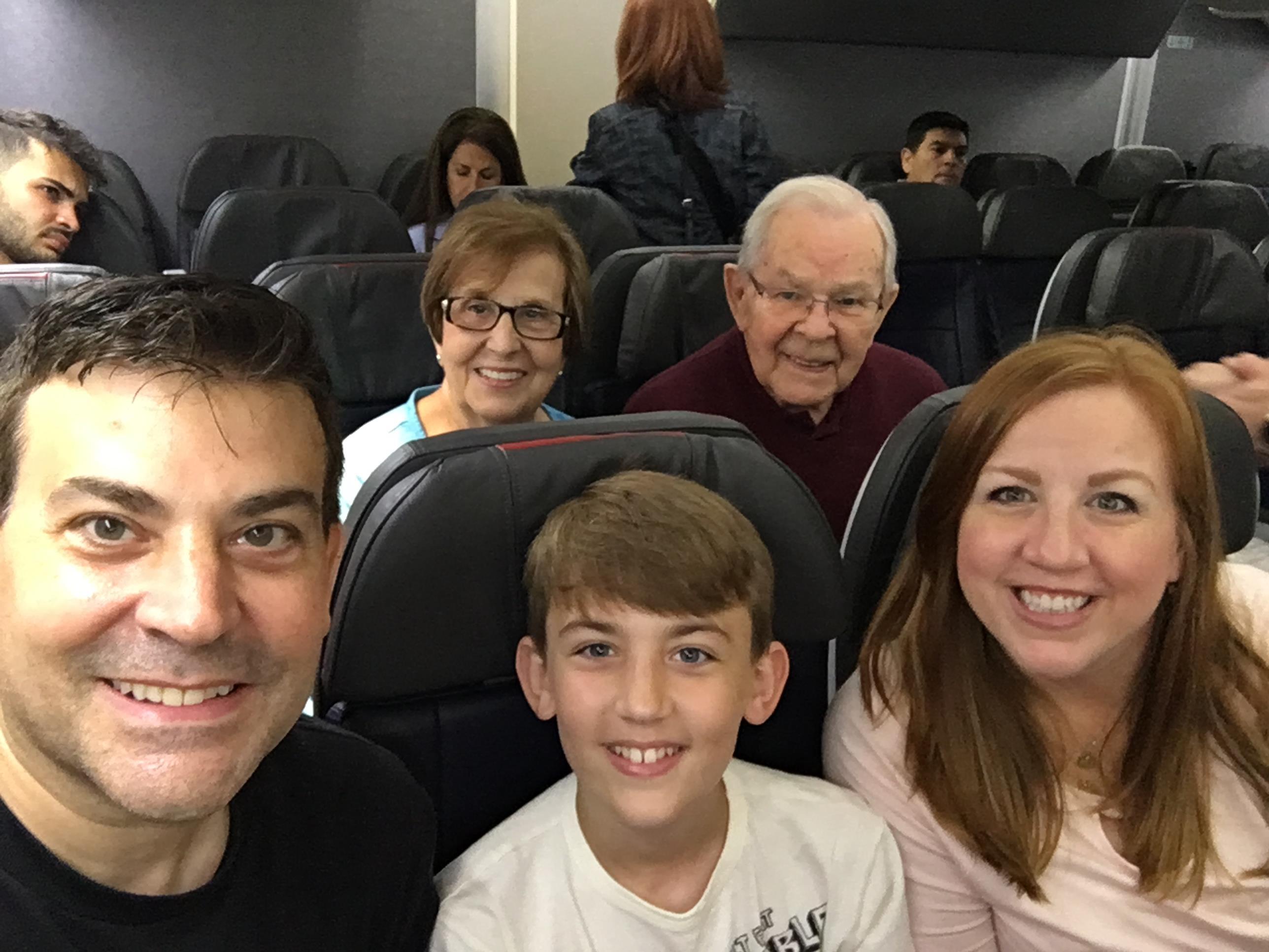 A group of people sitting in chairs